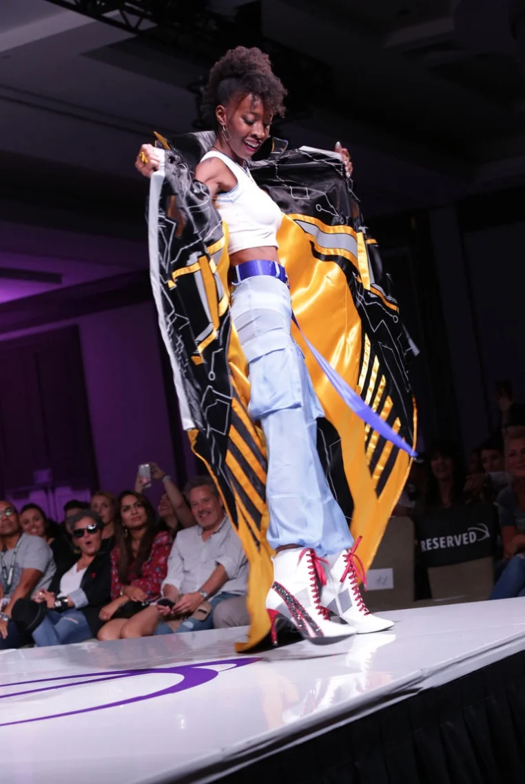 Mackenzi Bell-Nugent, a two time cancer survivor, totally slayed the runway with her walk! Photo by Jay Julio from TV Guide.