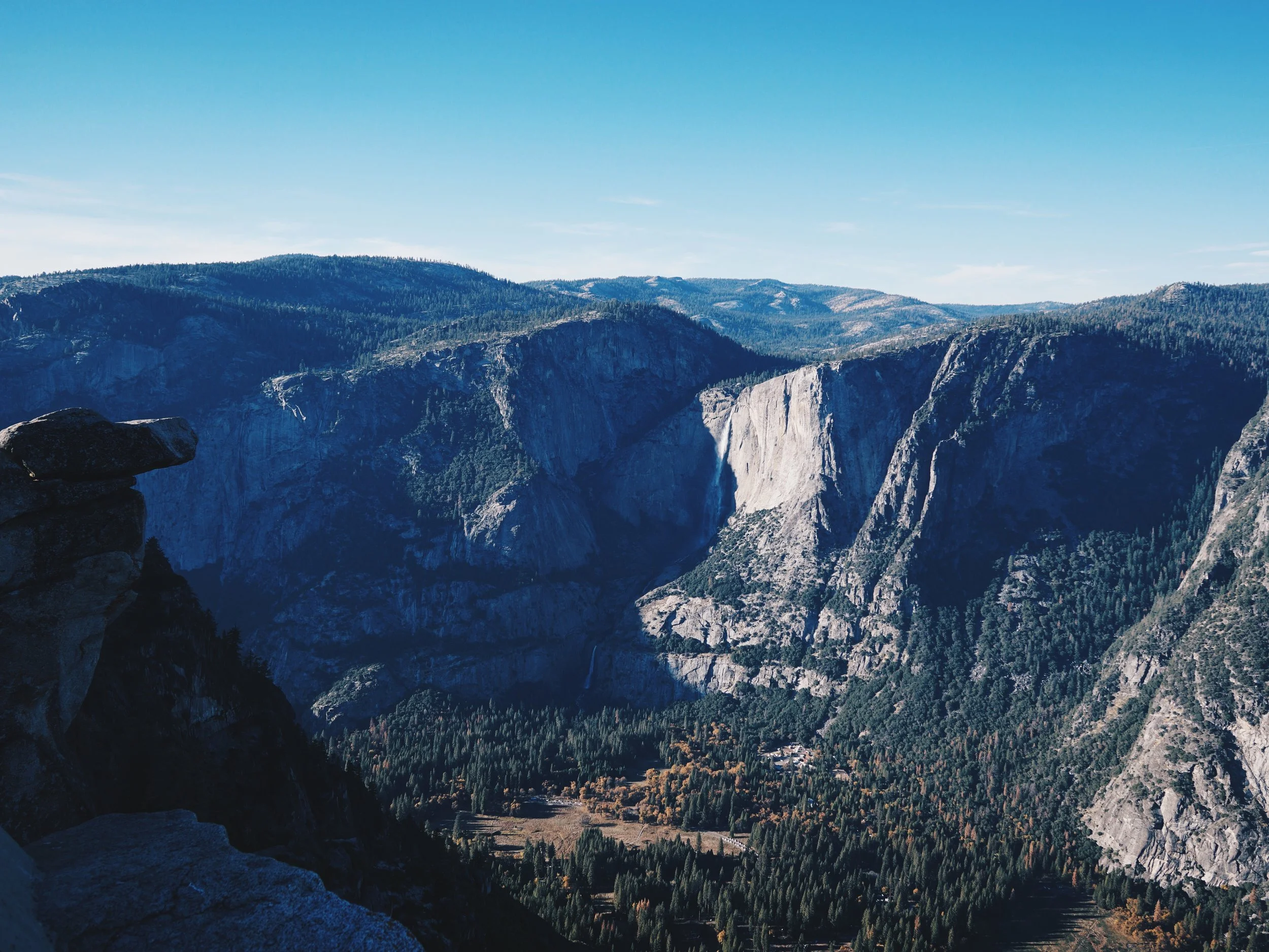 Wow. Hanging rock at Glacier Point. In the far distance is a waterfall if you can spot it.&nbsp;