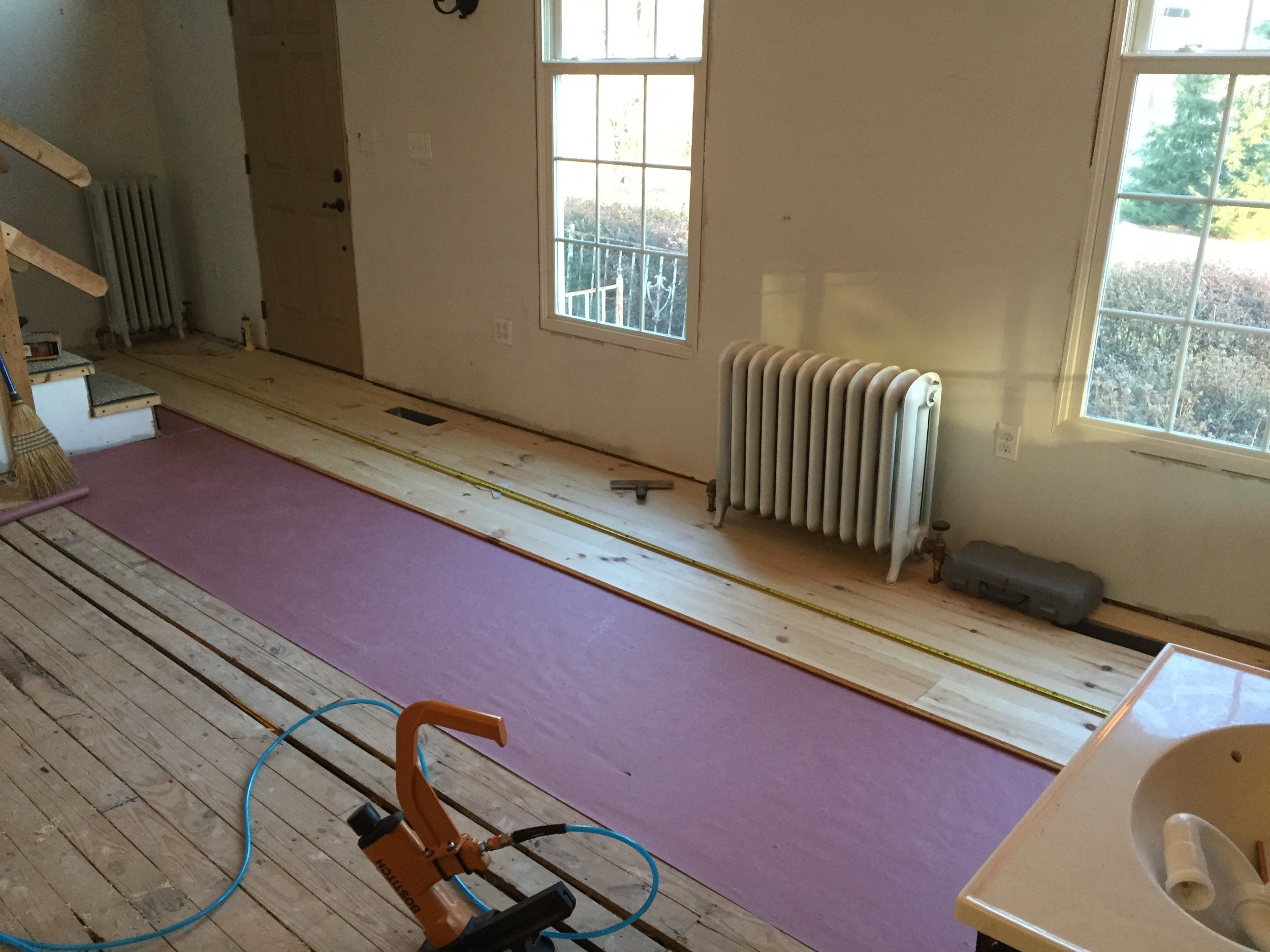  After the old floors had been removed, new 8" wide red pine floors were installed.&nbsp; 