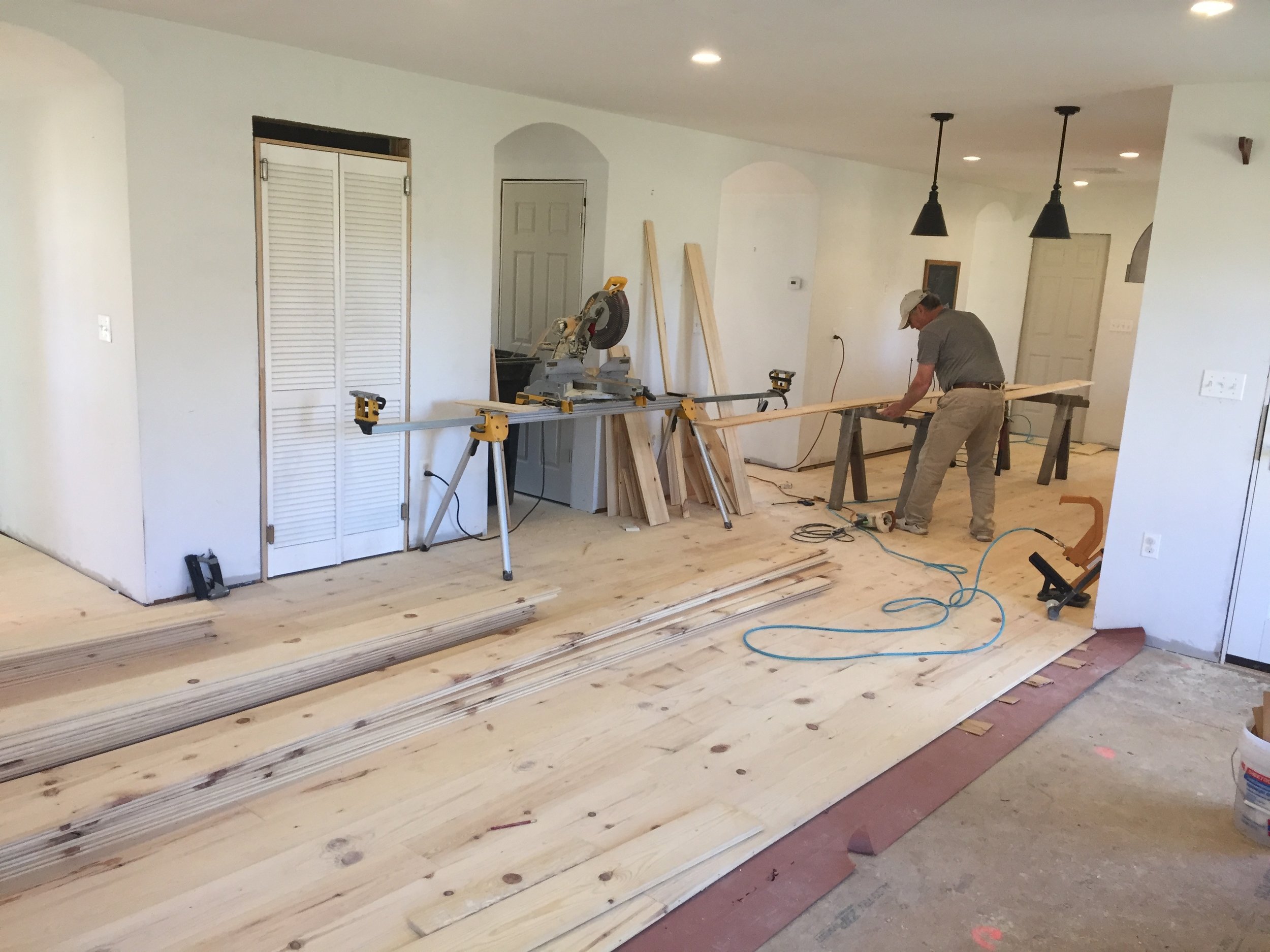  New floors being installed in the kitchen and living room.&nbsp; 