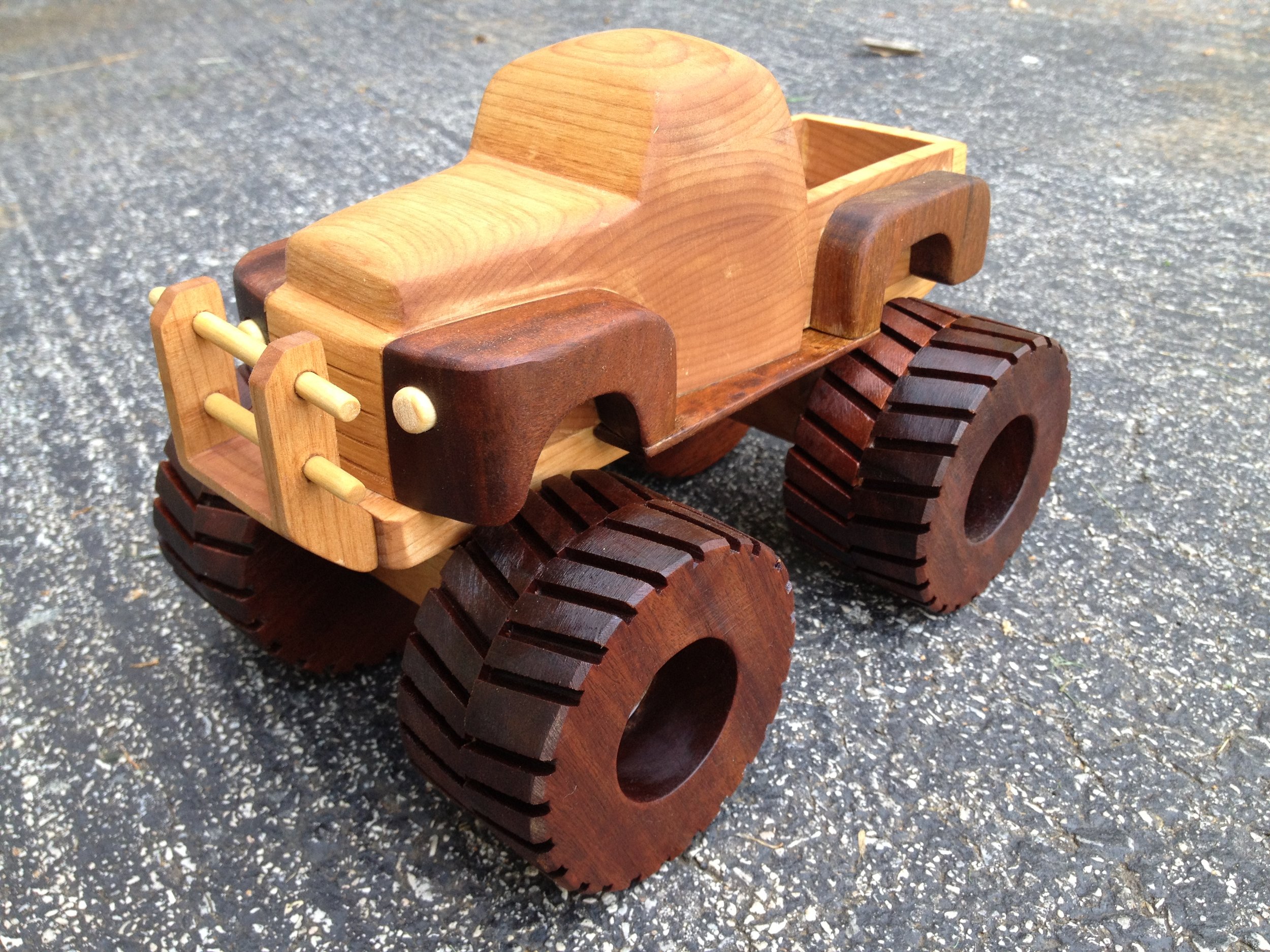  The completed truck, finished with several coats of boiled linseed oil. The wheels, like the wheel wells, are made of ipe.&nbsp; 