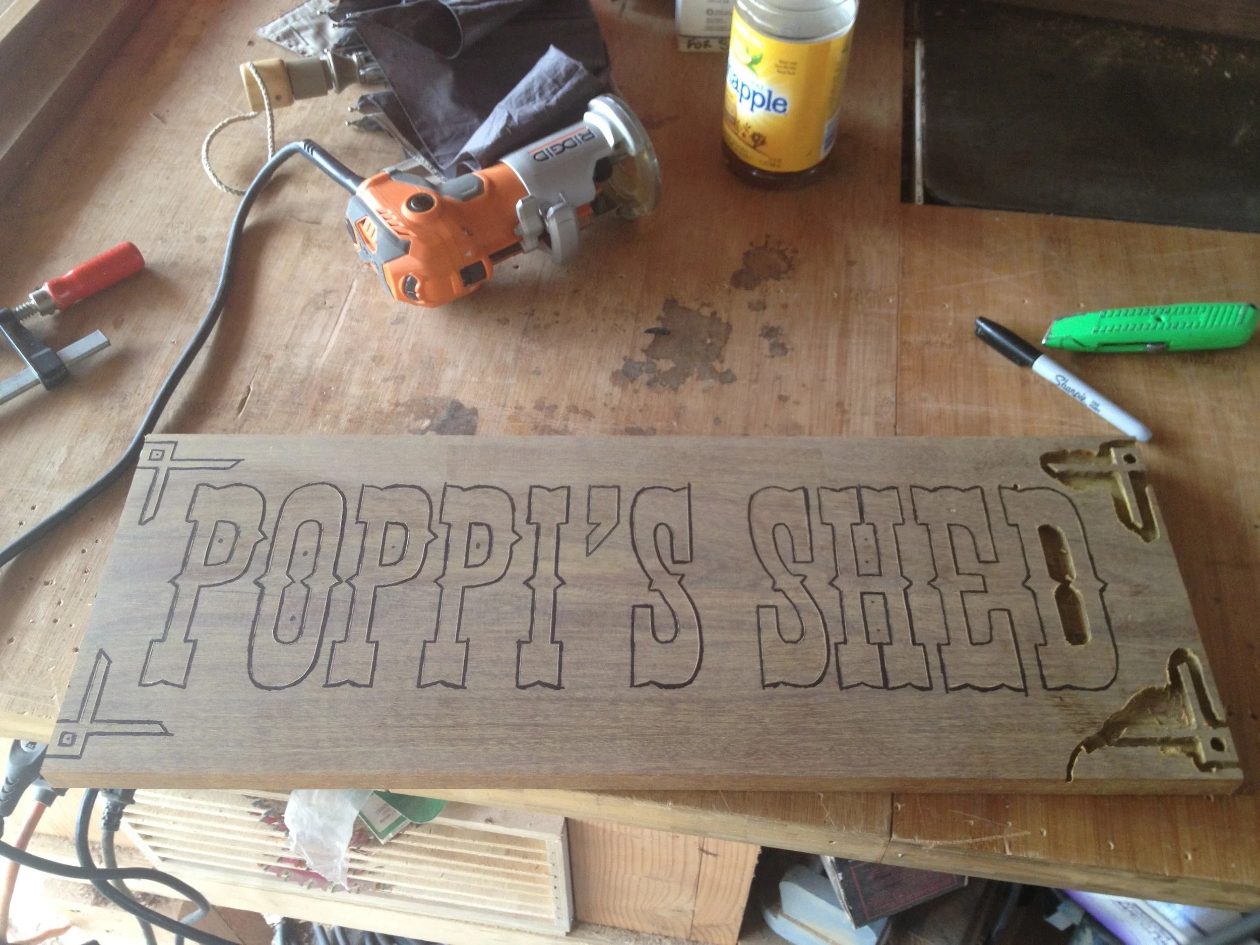  After transferring the marks with a knife, I traced them with a sharpie for better visibility and began to remove material using a trim router.&nbsp; 