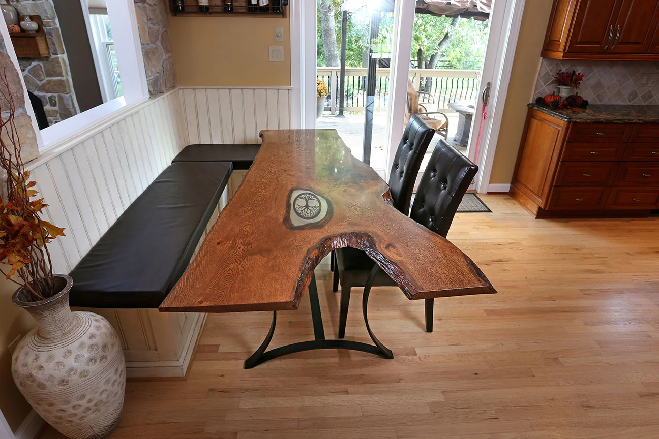 The client had custom cushions made for the bench tops, shown here alongside the live edge white oak table I made as part of the overall project . 