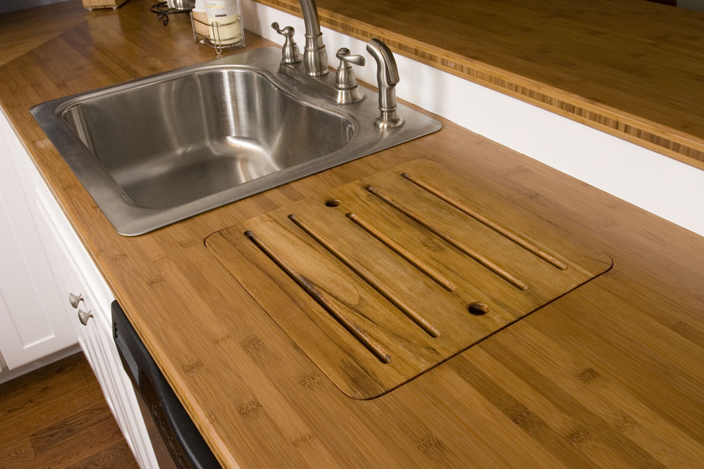  Teak drainboard next to sink for drying dishes 