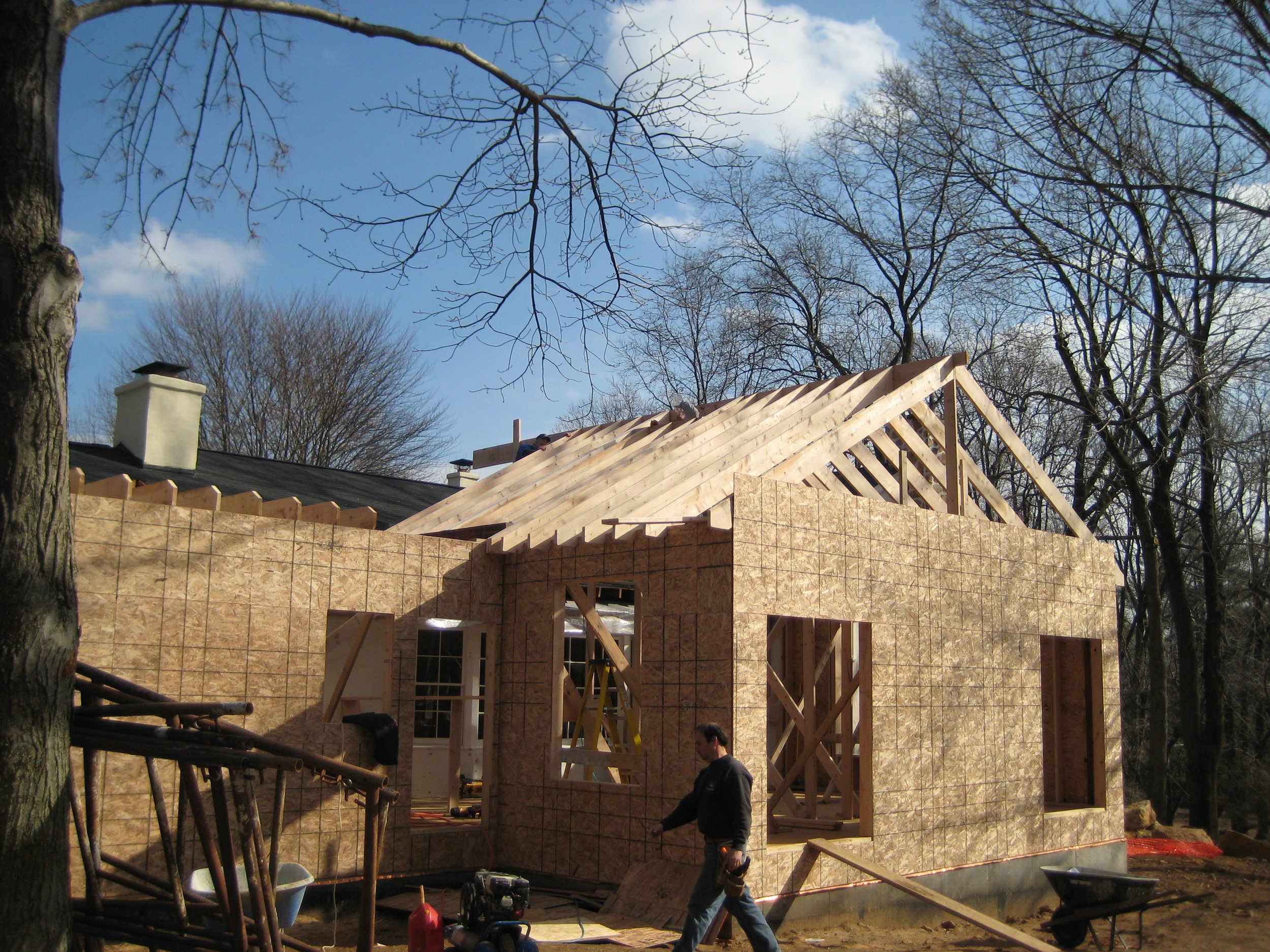  Walls going up and roof framing 