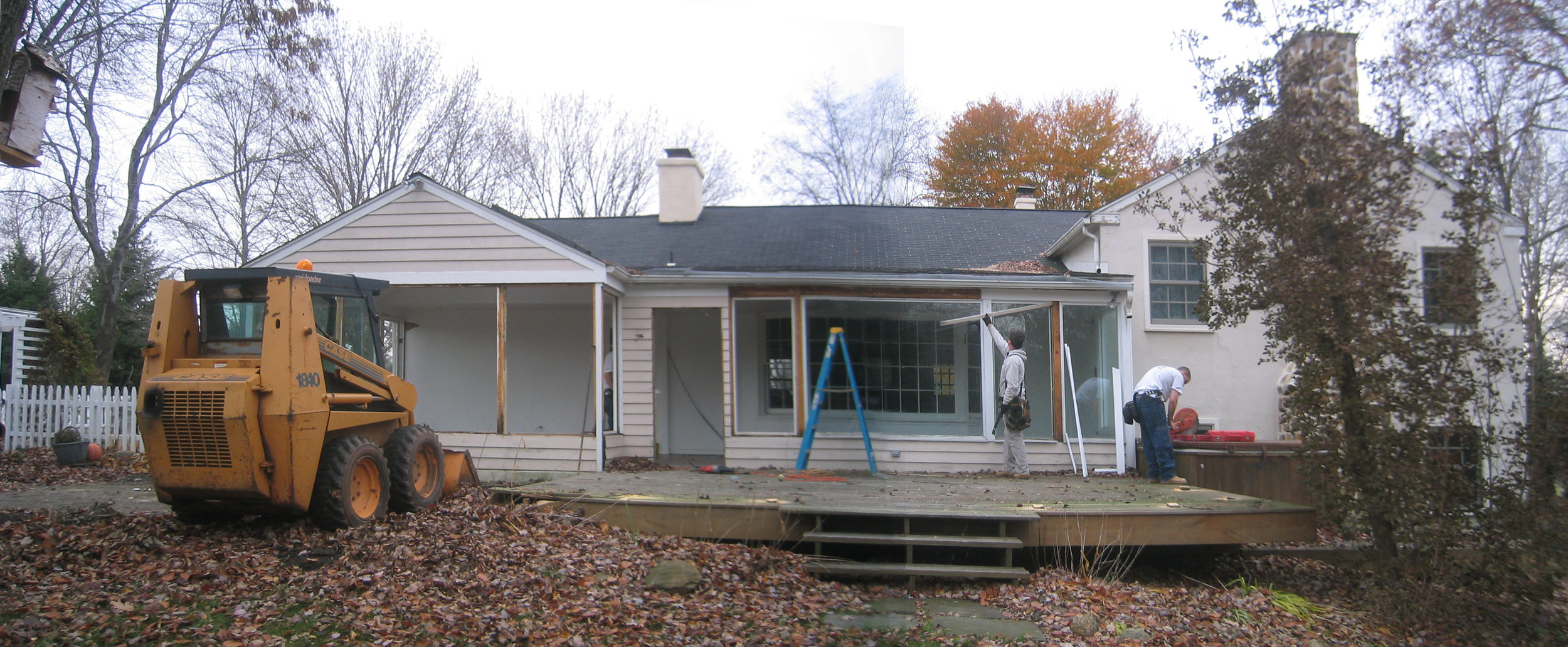  This job was brought to us by a fellow contractor who wanted us to build the outer shell of this addition. Once it was up and weather-tight,&nbsp;he would complete the interior renovations.&nbsp;"Before" picture of original sunroom and deck during t