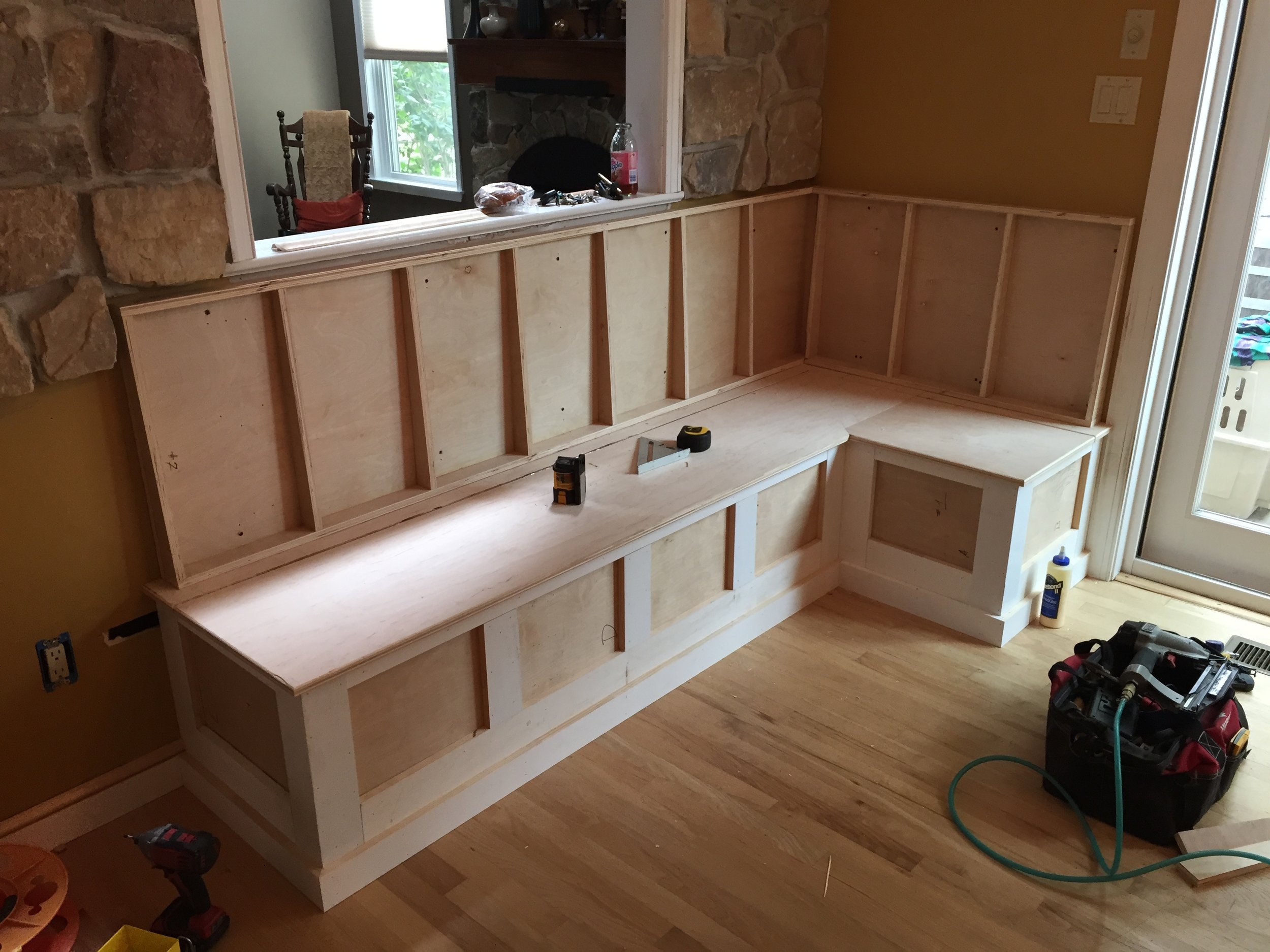  With the bench tops on and the back panels being framed up, it begins to take shape.&nbsp; 