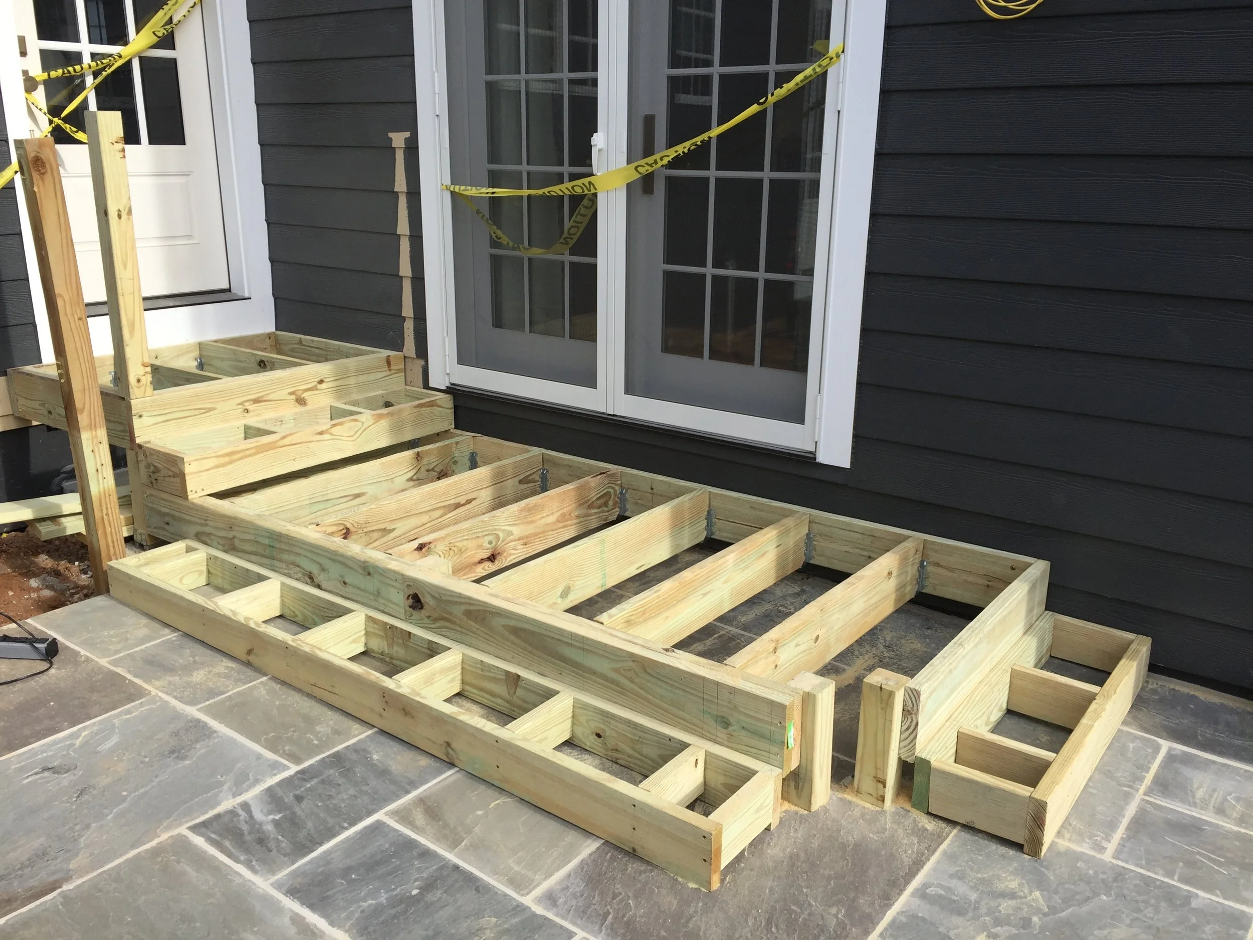  The main framing is installed. The open framing at the corners is where the steps will curve around.&nbsp; 