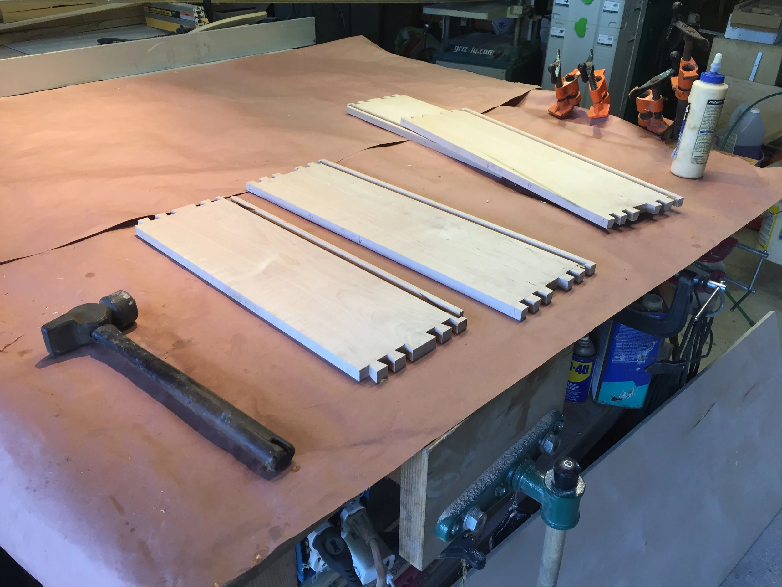  Drawer sides dovetailed and grooved to hold the bottom pieces 