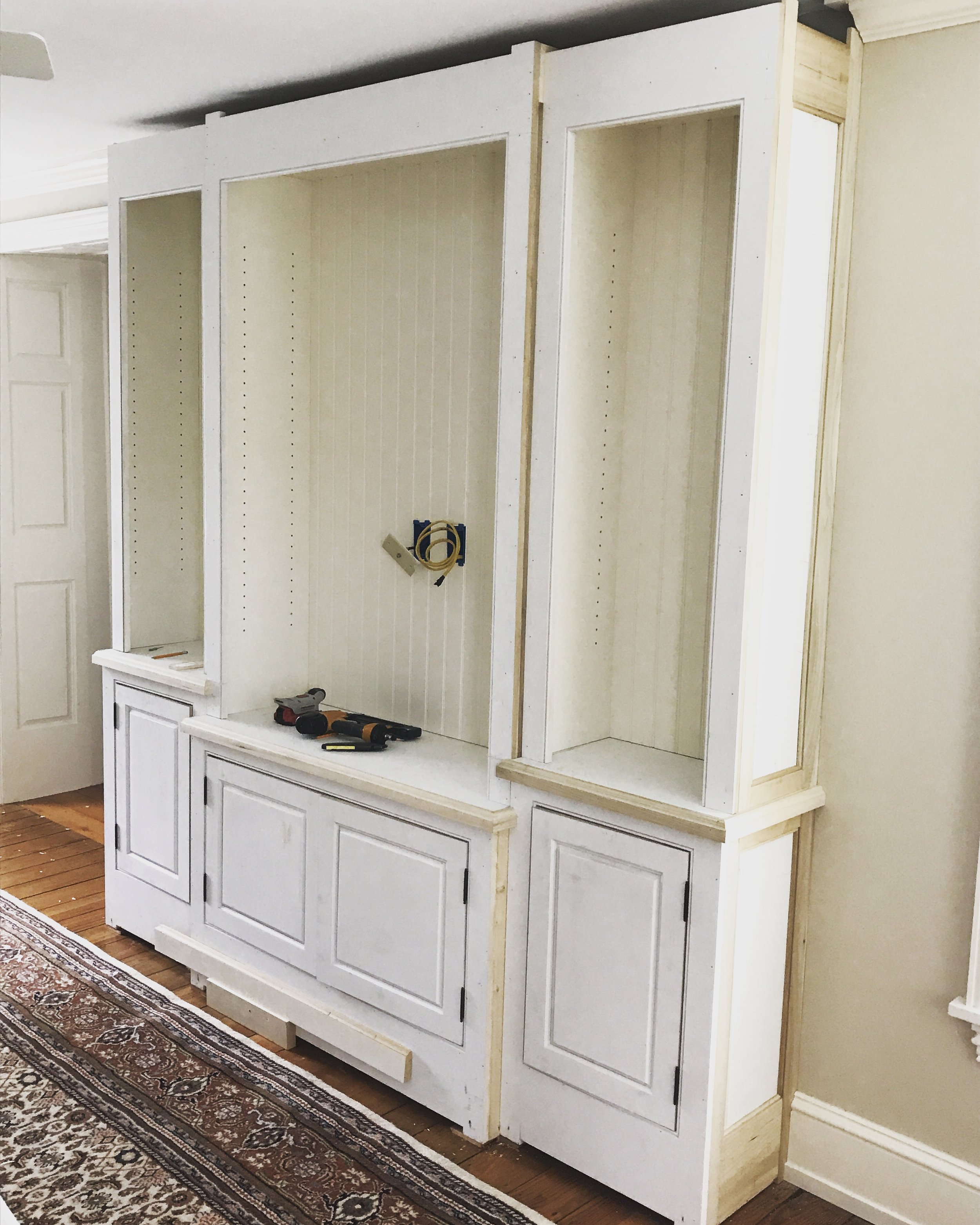  After the upper cases were set, doors were hung, and the end panels were installed my part of this job was complete. The clients would handle the installation of the crown molding and baseboards, as well as installing the pulls and painting.&nbsp; 