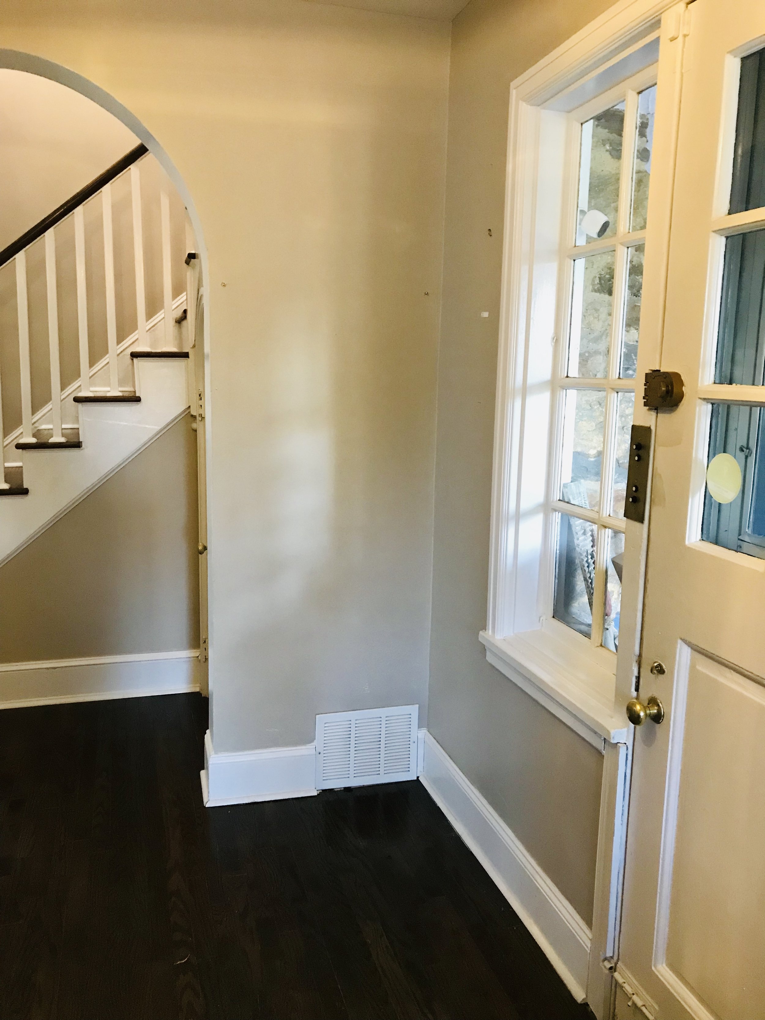  A longtime client asked me to create a mudroom space for them in this little corner by their front door.  They liked the look of a mudroom locker built in I had done a few years back with black walnut benches and white trim work, so using that as in