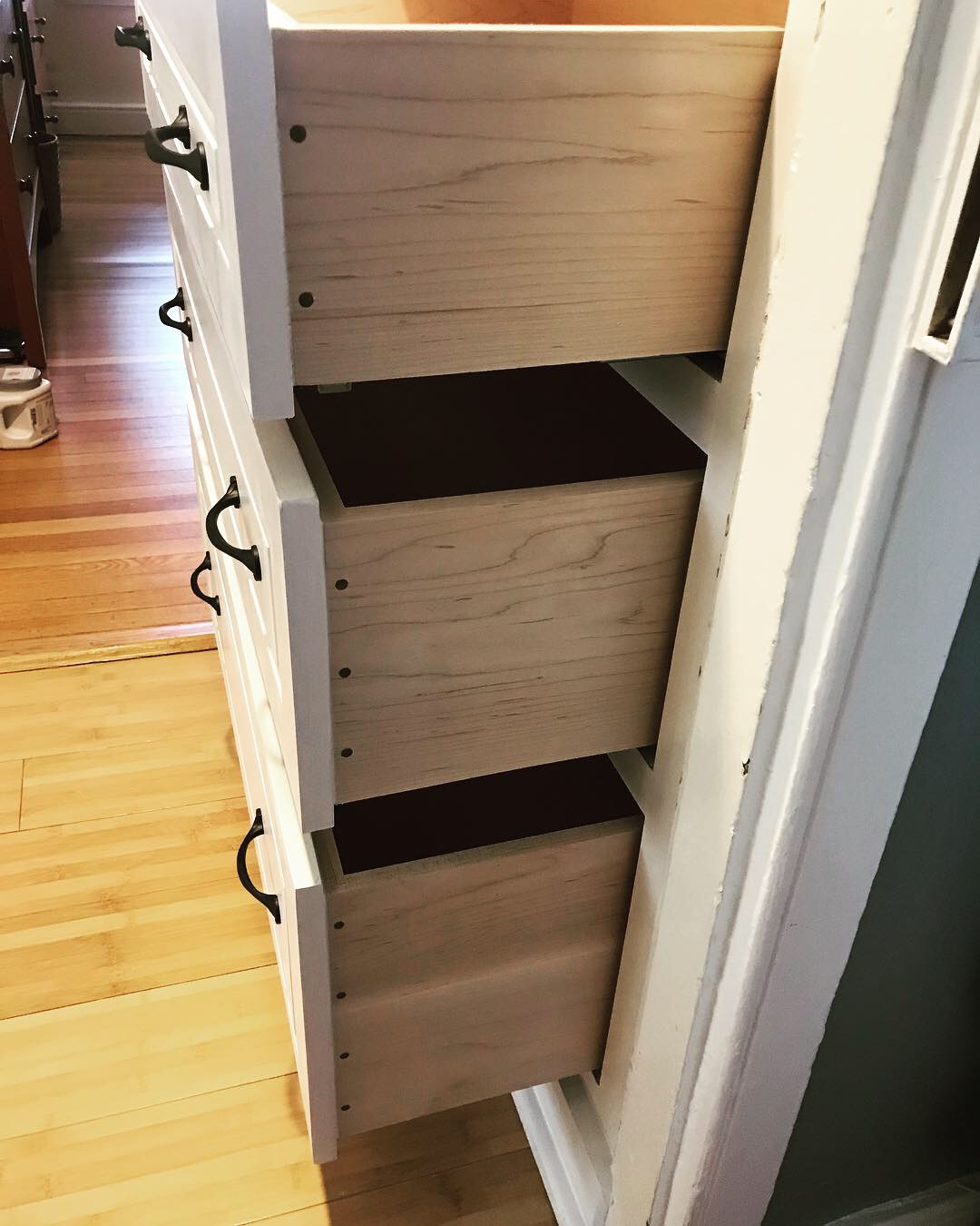  Three large maple drawers provide plenty of storage space below. All the drawer boxes are made from solid maple with housed rabbet joints in the corners, which are reinforced by the black walnut pegs. Each drawer is on a soft close undermount slide 