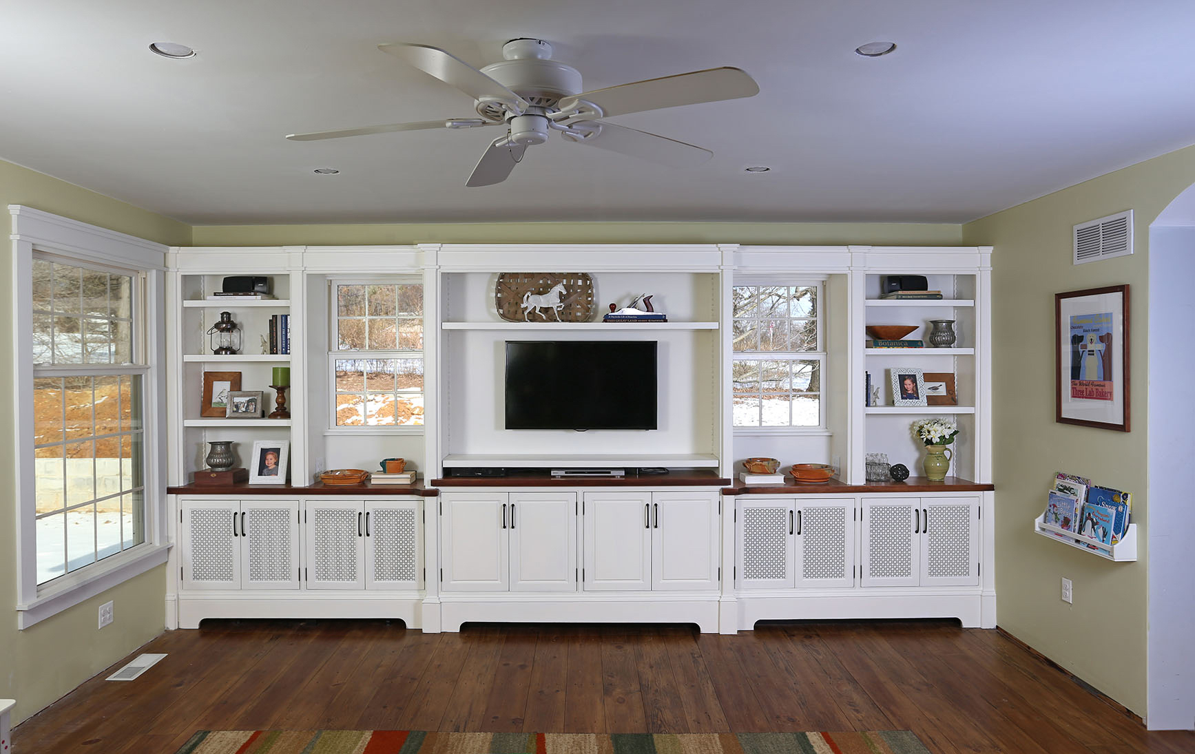  This is a set of built-ins I made for my personal home. Designing your own project affords the luxury of taking your time with the design. As with most of my built-ins, the countertops and doors are made from solid maple; however, there are many hid