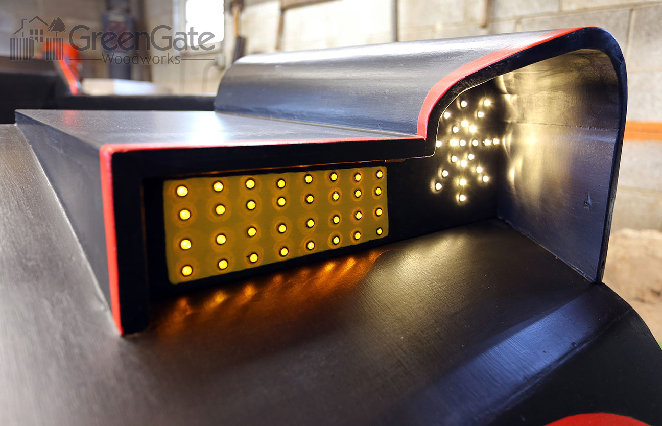 A close up shot of the headlight assembly and the Bat-ray.