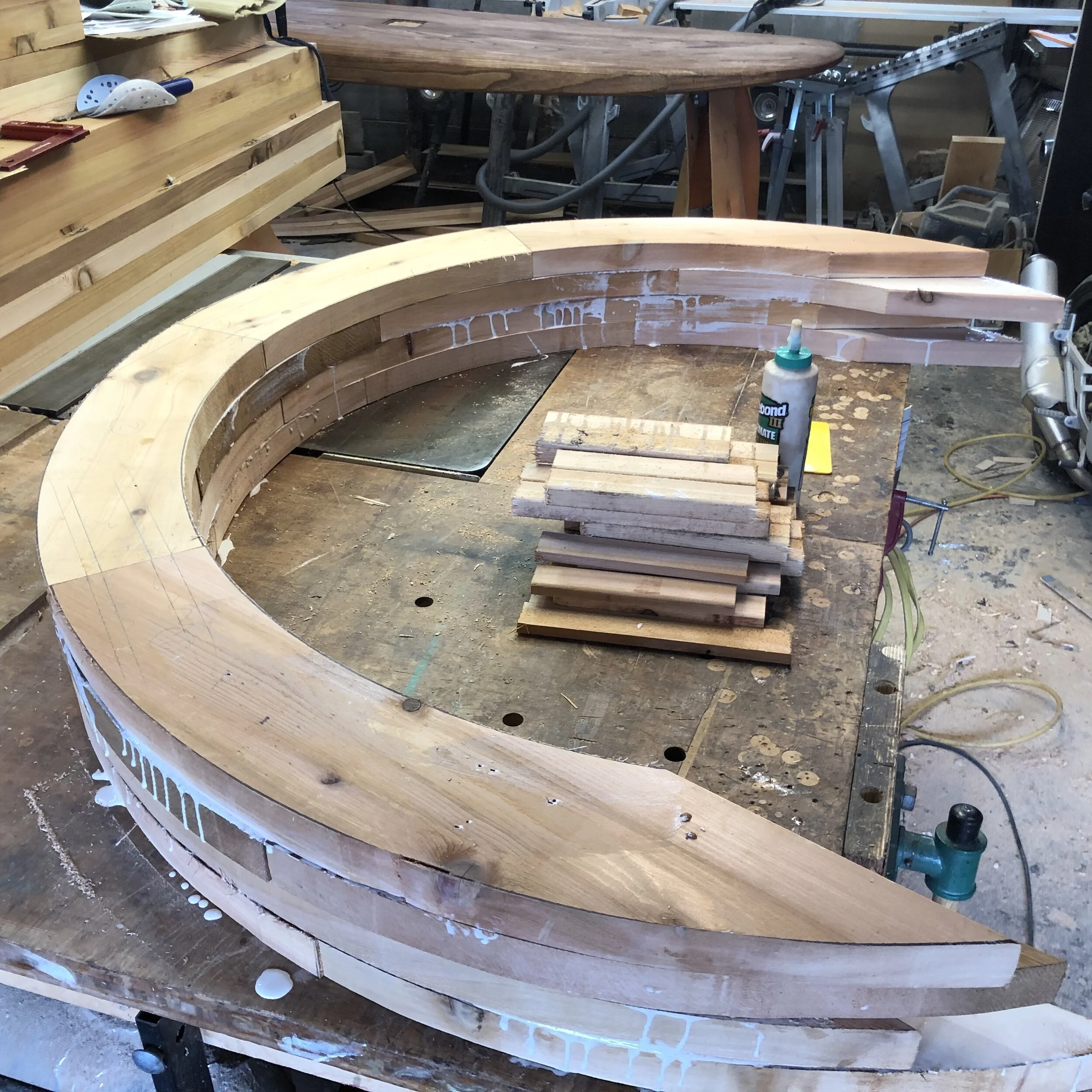  Next up I got to work on fabricating the large outer arch. Multiple layers of cedar were used to create this arch, along with a lot of waterproof wood glue.  