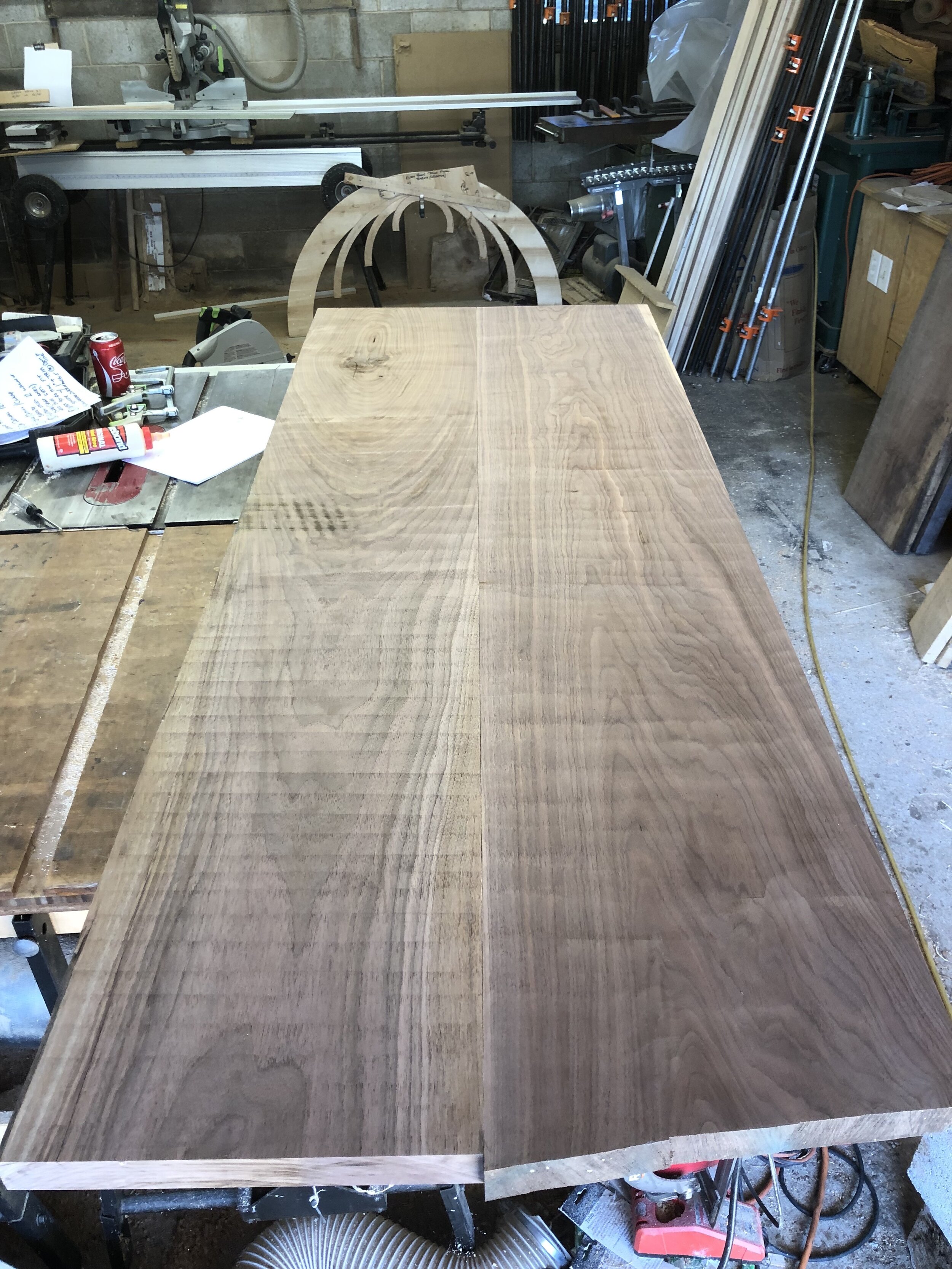  Next up was milling some black walnut planks to make a bench top. After I had them roughly planed to size, I played around with which sides to join up until I was happy with the look.  