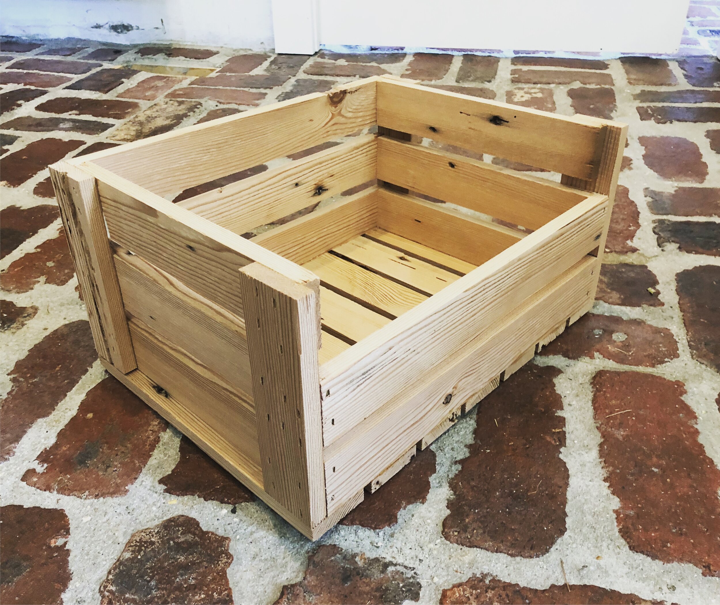  I designed the upper area of our lockers to have a smaller cubby section for storing smaller items, hats, gloves, etc. My wife and I were unable to find baskets we liked for the space, so I created this apple crates from some reclaimed pine I had in