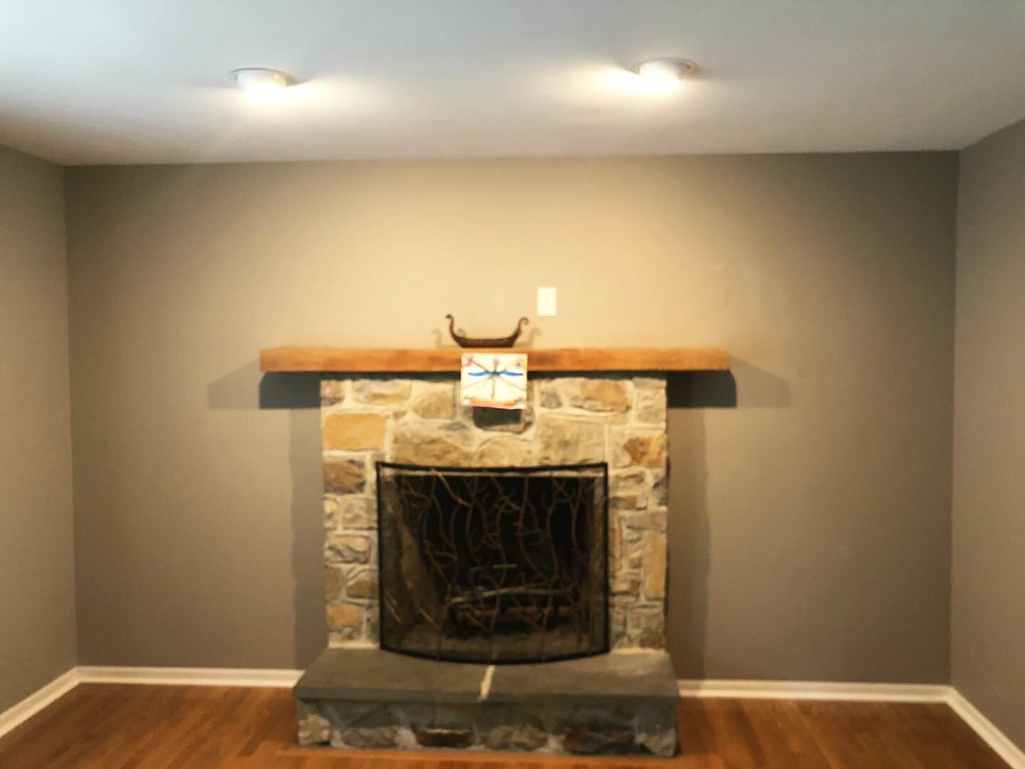  For this project the clients wanted to add built-ins on either side of their fireplace to give them additional storage and shelf space for a large collection of books. The existing mantle was red oak, and the clients were interested in having new co