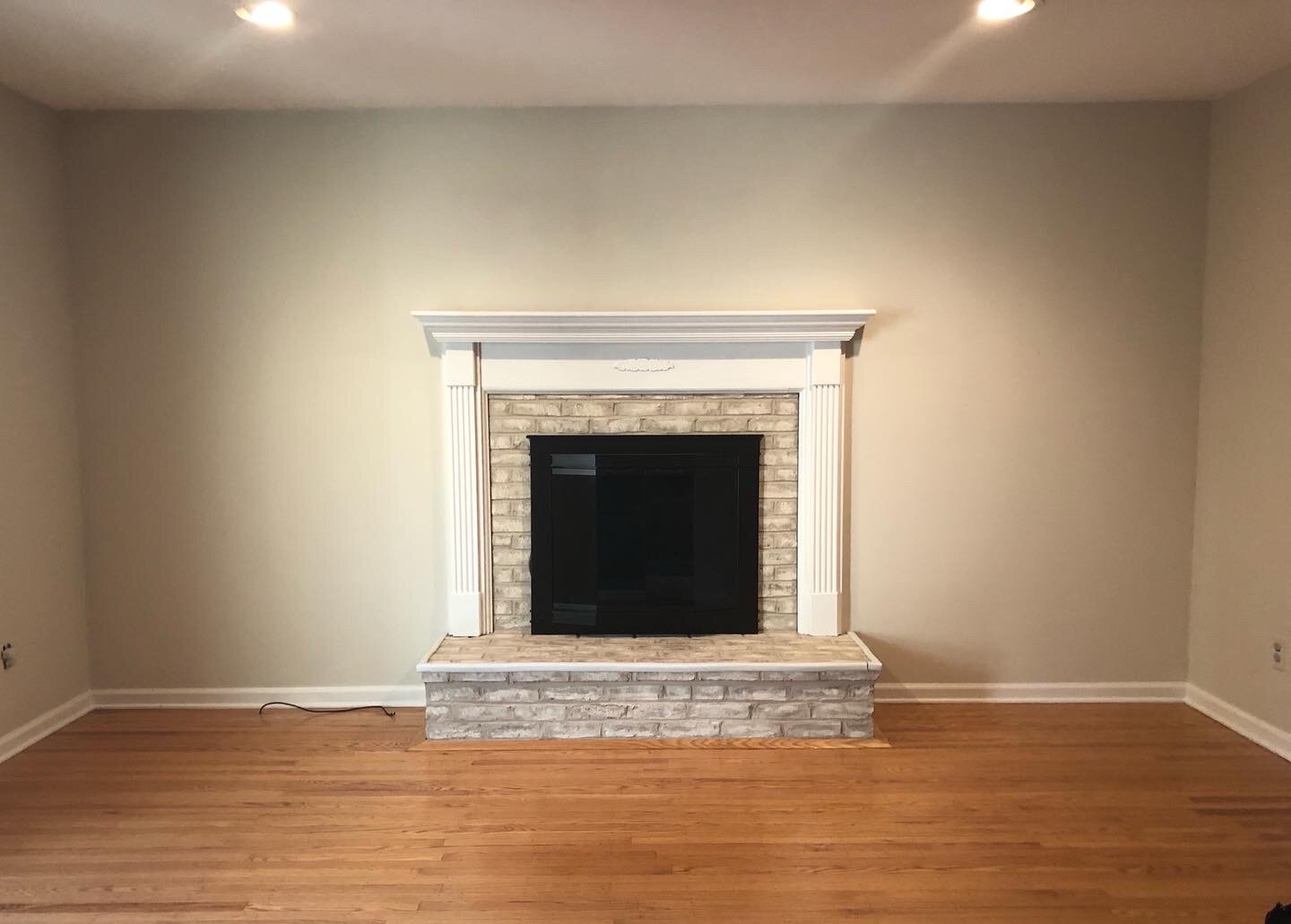  A client contacted me to create a set of built-ins flanking their existing fireplace. This was the space before I started. 