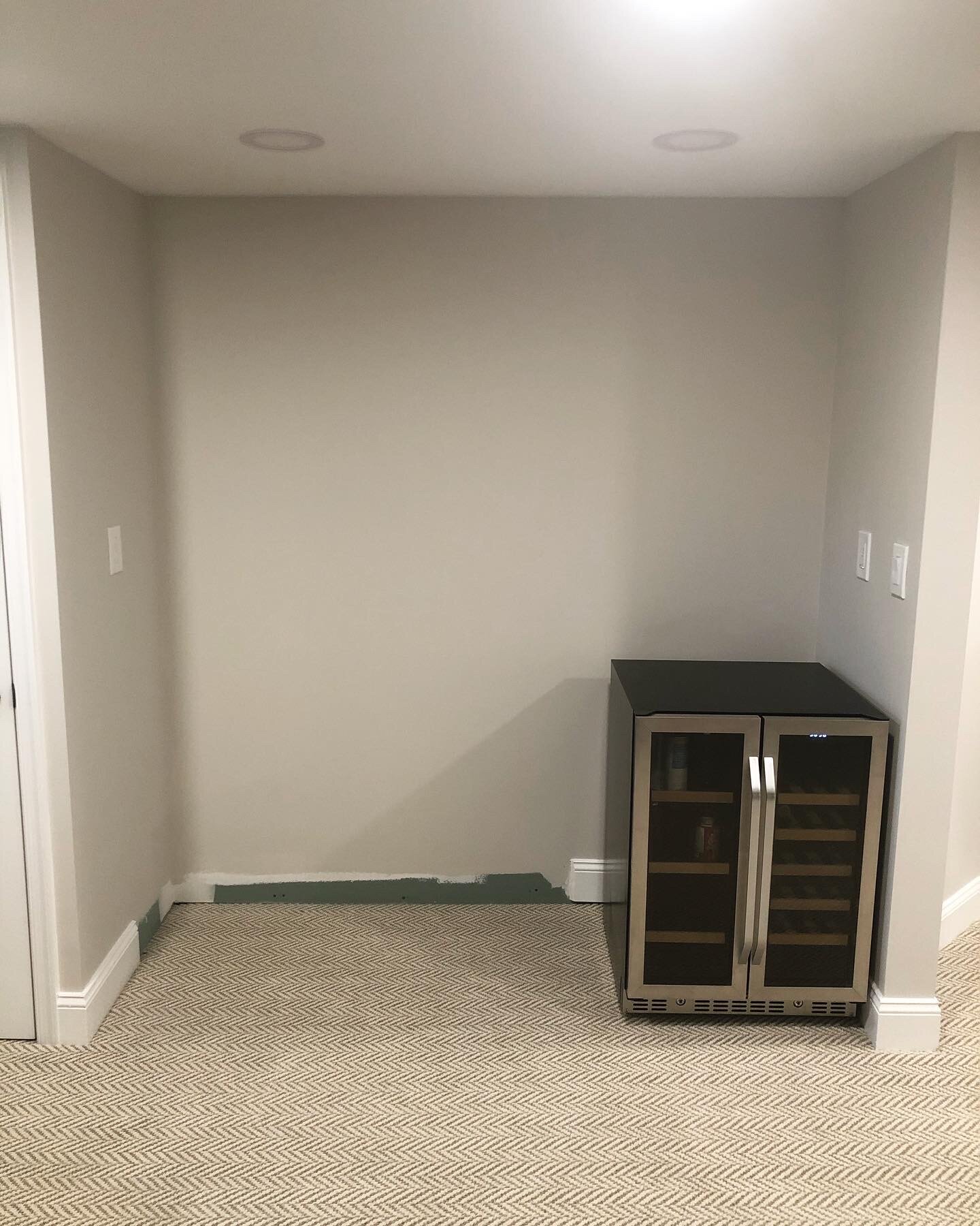  A client asked me to create a built-in bar for this alcove in their basement. They had an existing wine fridge they wanted to incorporate into the design as well.   
