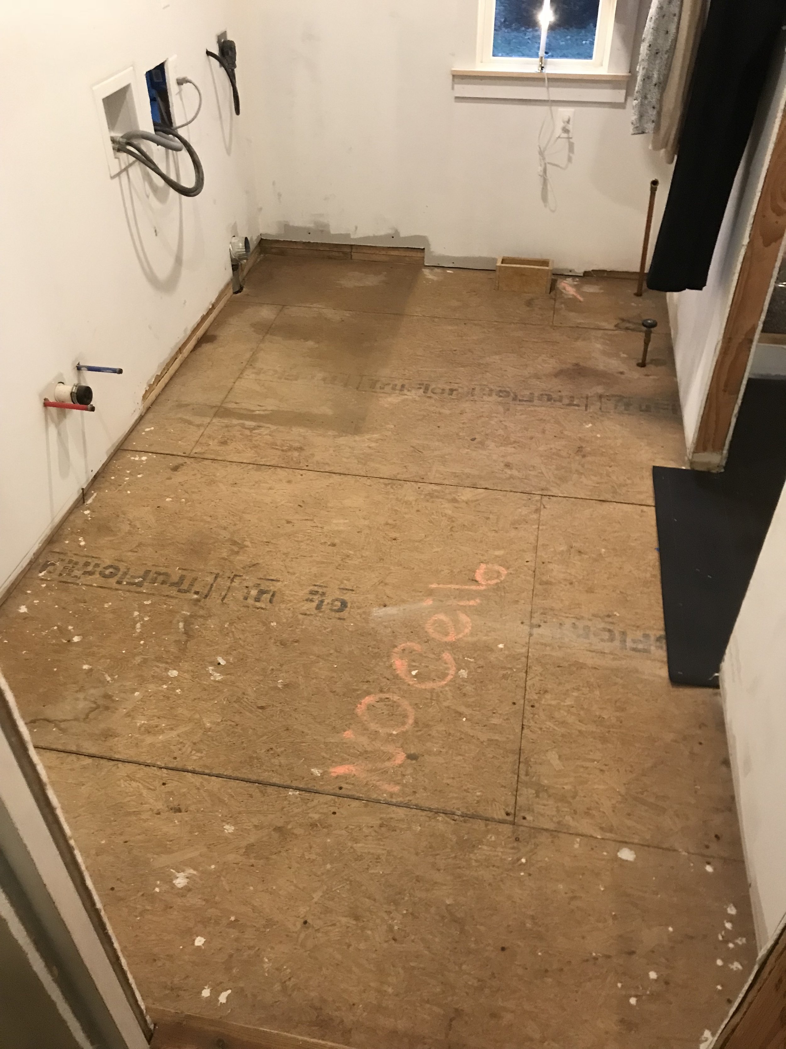  My own laundry room renovation was a project that was a few years in the making, and much more involved than my normal built-in projects. Our plans included installing a reclaimed brick floor, so the first step was to clear the room out.  