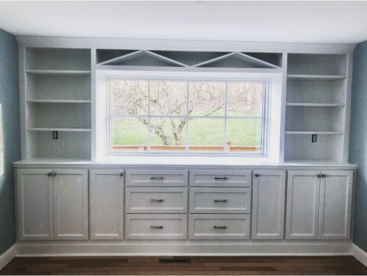  The finished product has flat panel overlay doors and drawers, and the entire piece frames their dining room window quite nicely. The lighting in this room wasn’t great for pictures so I had to lighten it a bit afterwards with editing software which