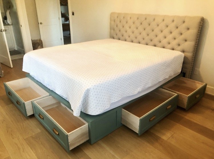  There are 6 total drawers under the bed, 2 one each side adn 2 at the foot of the bed. The drawers are all made from solid maple with housed rabbet joints in the corners, reinforced with walnut dowels, and mounted on soft-close undermount drawer sli