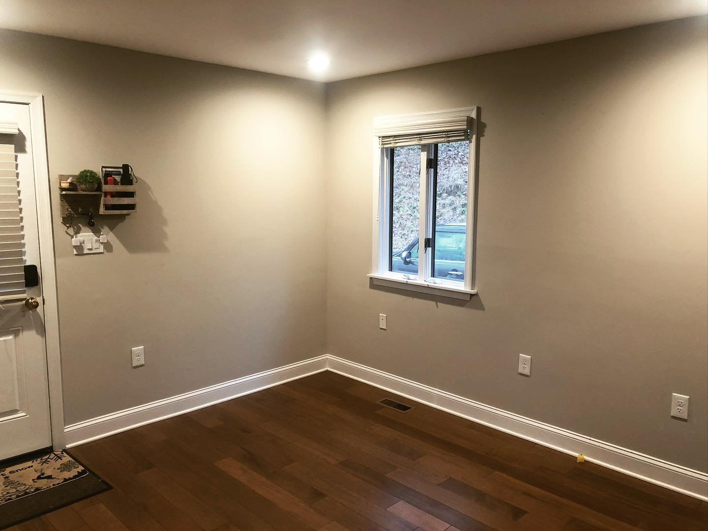  For this project the client was looking for a way to make this corner of their first floor more useful as a seating area and a mini-mudroom of sorts by their entry. 