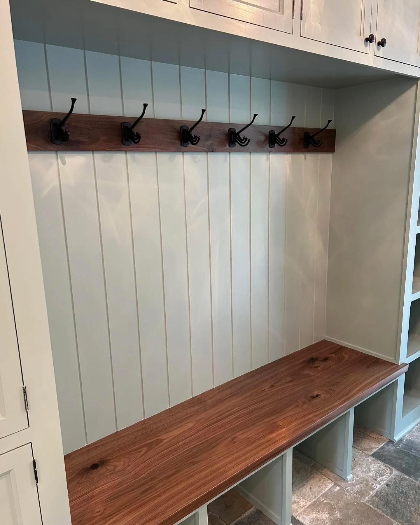  The custom wainscoting in the main hanging area adds a nice subtle detail to stand out from the crowd. This project was painted using Fine Paints of Europe Eco Satin in Farrow &amp; Ball’s Blue Grey&nbsp; #91.  