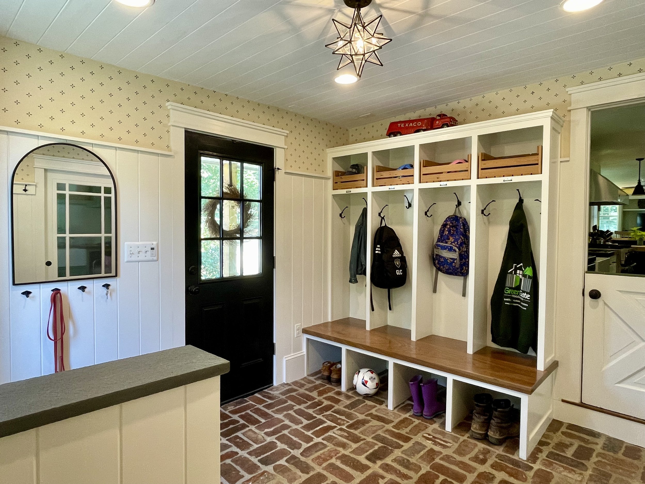  Our  mudroom lockers  include a black walnut bench, custom crates up top for smaller items, and true Penco brand locker numbers.  