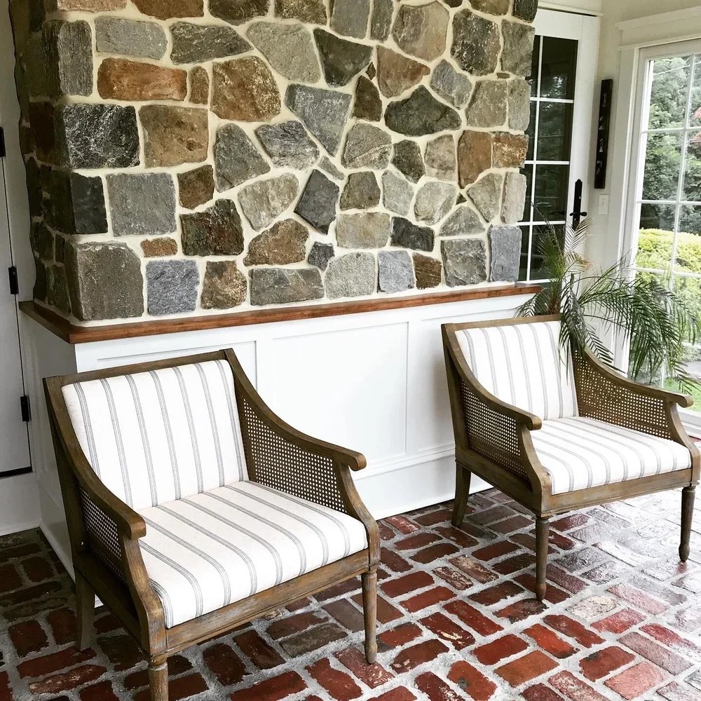  The last of the three porch rooms is our sunroom that we call  the greenhouse.  In addition to the reclaimed brick floors and wainscot ceiling, it has stone to match the exterior of the house, custom paneling, and, naturally, plenty of plants. Ducts