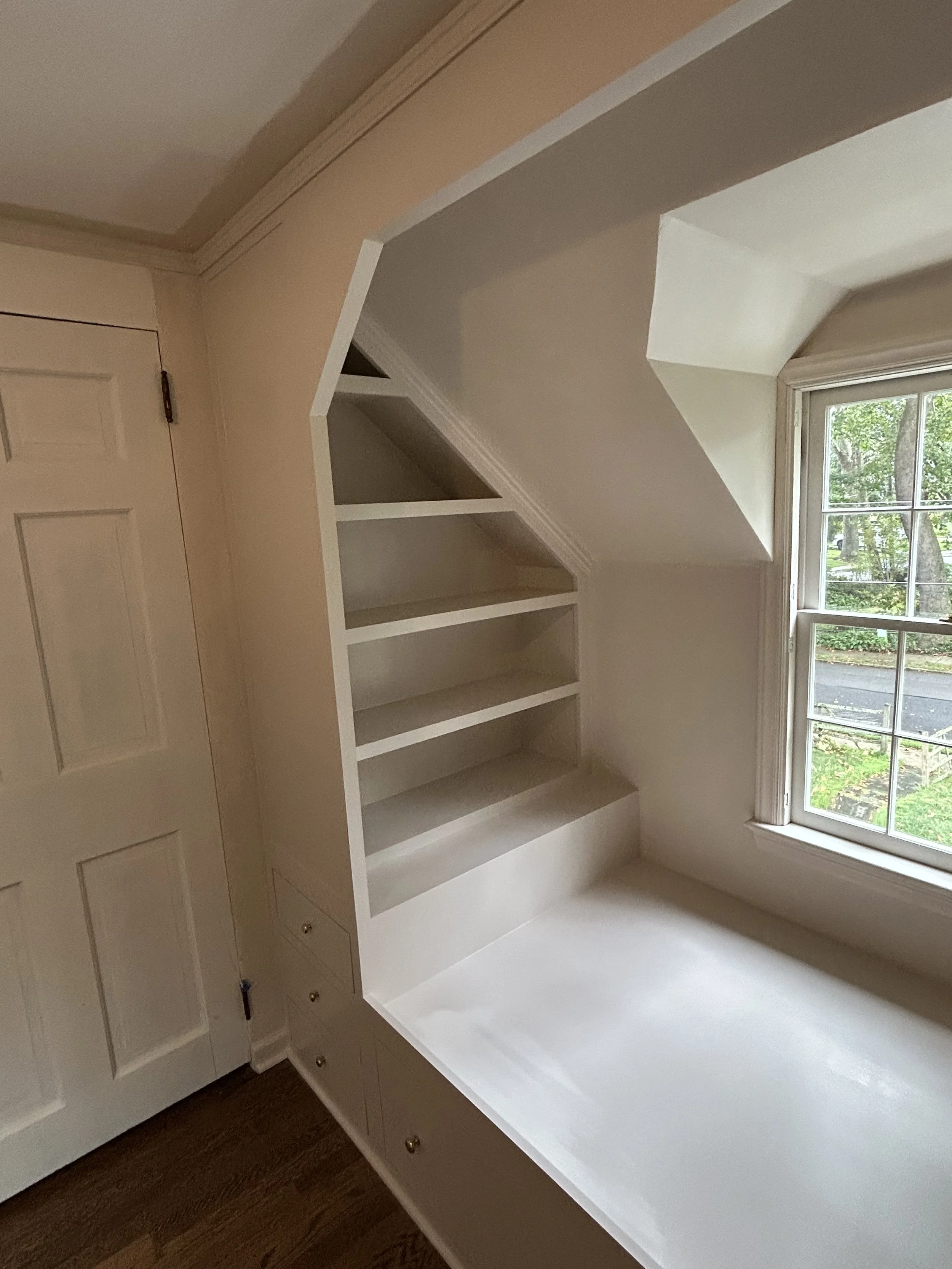  The shorter footboard allows for an extra shelf compared to the headboard shelves.  