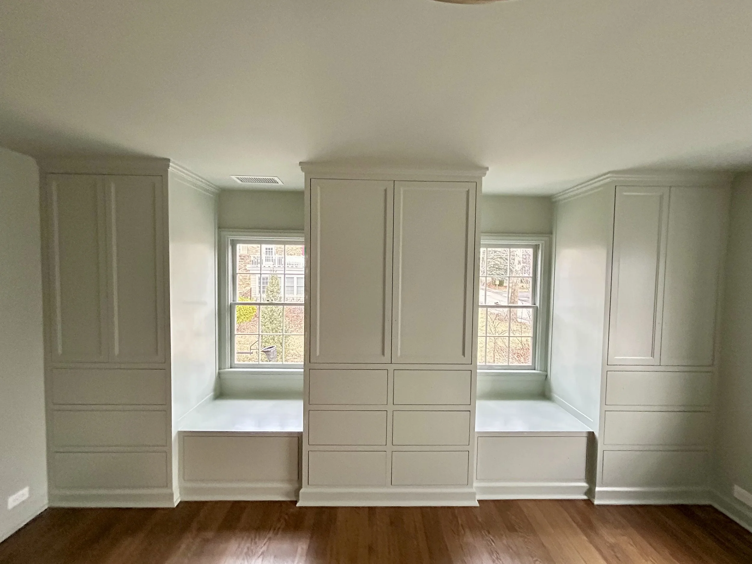  A repeat client came to me with this project for their master bedroom. They wanted to replace their original Ikea wardrobes with something more permanent that would give them additional storage. The door knobs and drawer pulls were on backorder when