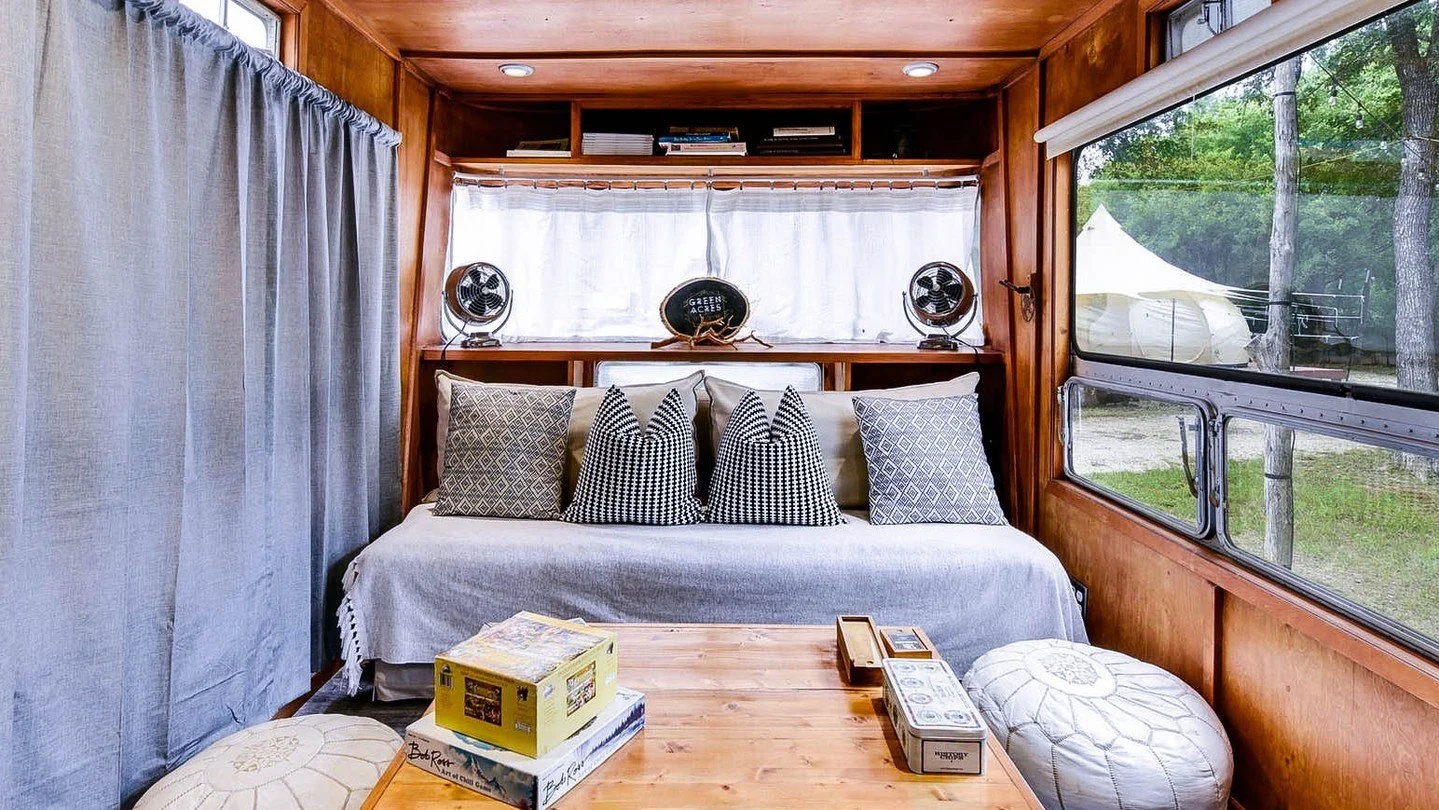 The Spartan Mansion Camper at Green Acres is a spacious retreat in the heart of nature! It comfortably sleeps up to 6 guests and offers an in-unit bathroom, kitchenette, A/C, and private fire pit perfect for roasting s'mores.

Professionally hosted b