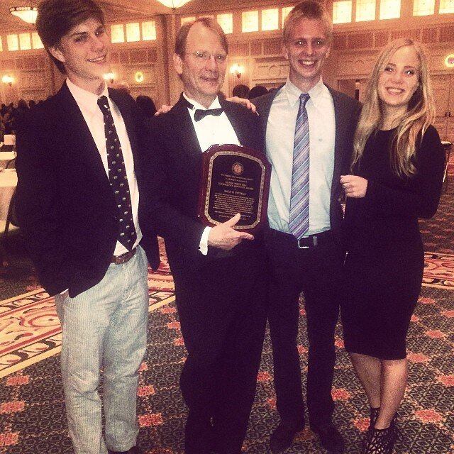  Dale celebrates his receipt of the Virginia Trial Lawyers Association Oliver Hill Courageous Advocate Award, with children Tim, Matt, and Linnea 