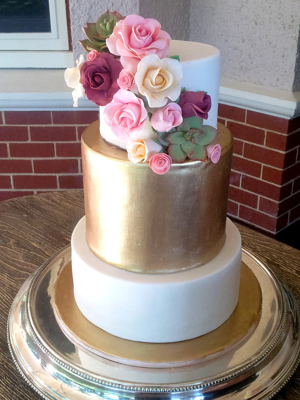 Gold with sugar roses and succulents