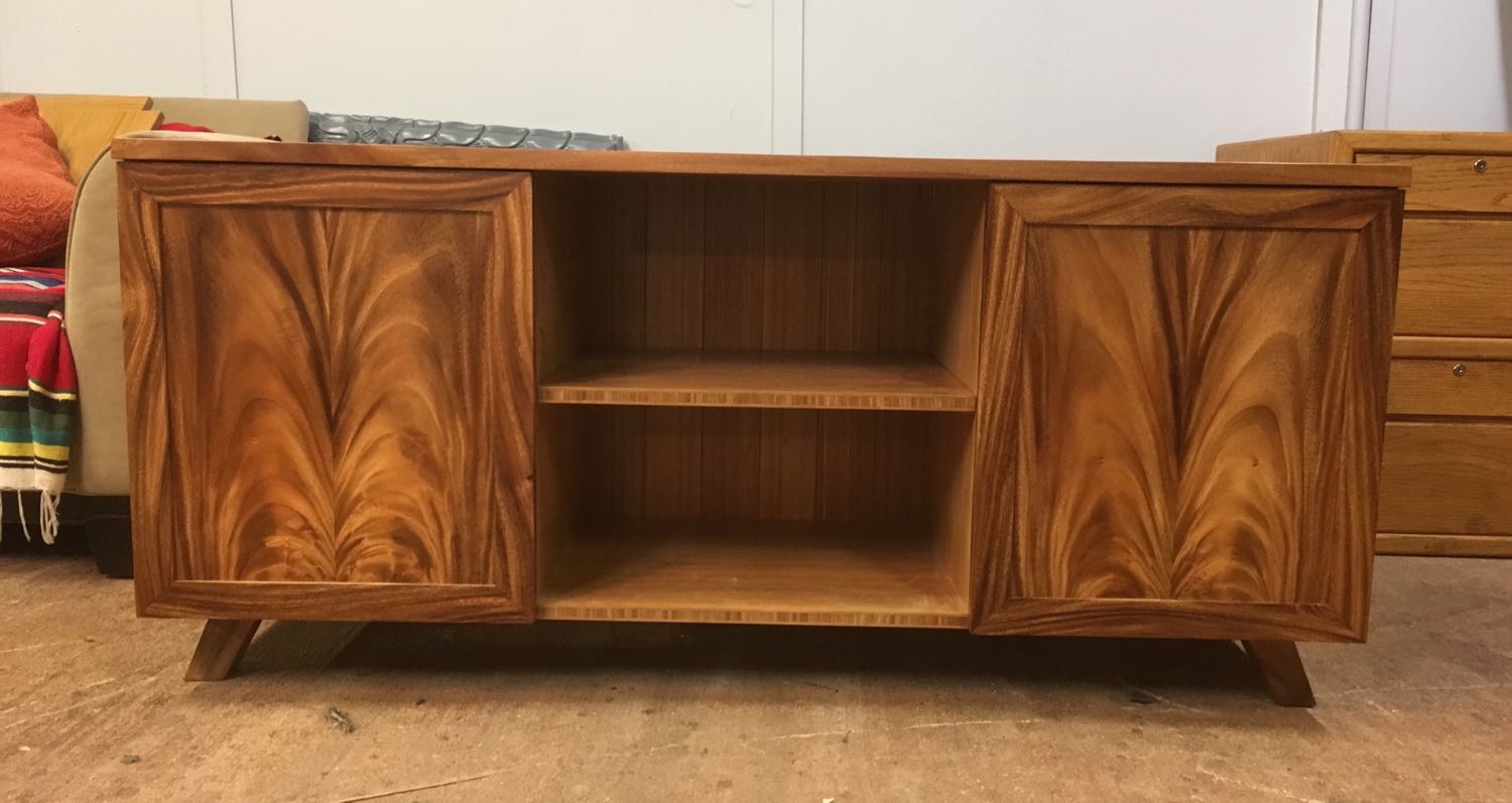 Completed custom monkeypod entertainment center