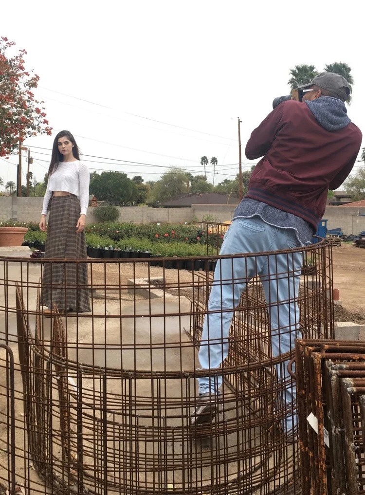 After observing the surrounding, Jason decides to move Azu into the foreground, choosing to keep the roses in the background in order to create soft bokeh out of them