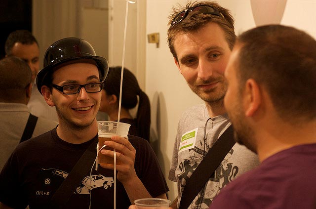 Chatting at a party. Image courtesy of Flickr user Iain Farrell