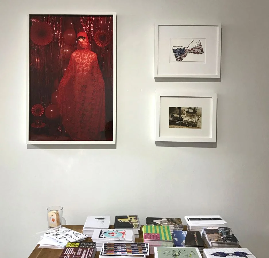Clockwise from left: Young Sun Han, Great American Spirit (Supplication) , 2017; Rachel Selekman, Titled Flag , 2017; Anonymous Photograph, 20th century, selected by Katherine Newbegin for the "Give Voice" Postcard Project