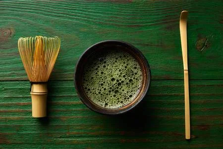 65791840-matcha-tea-bamboo-whisk-chasen-and-spoon-for-japanese-ceremony.jpg