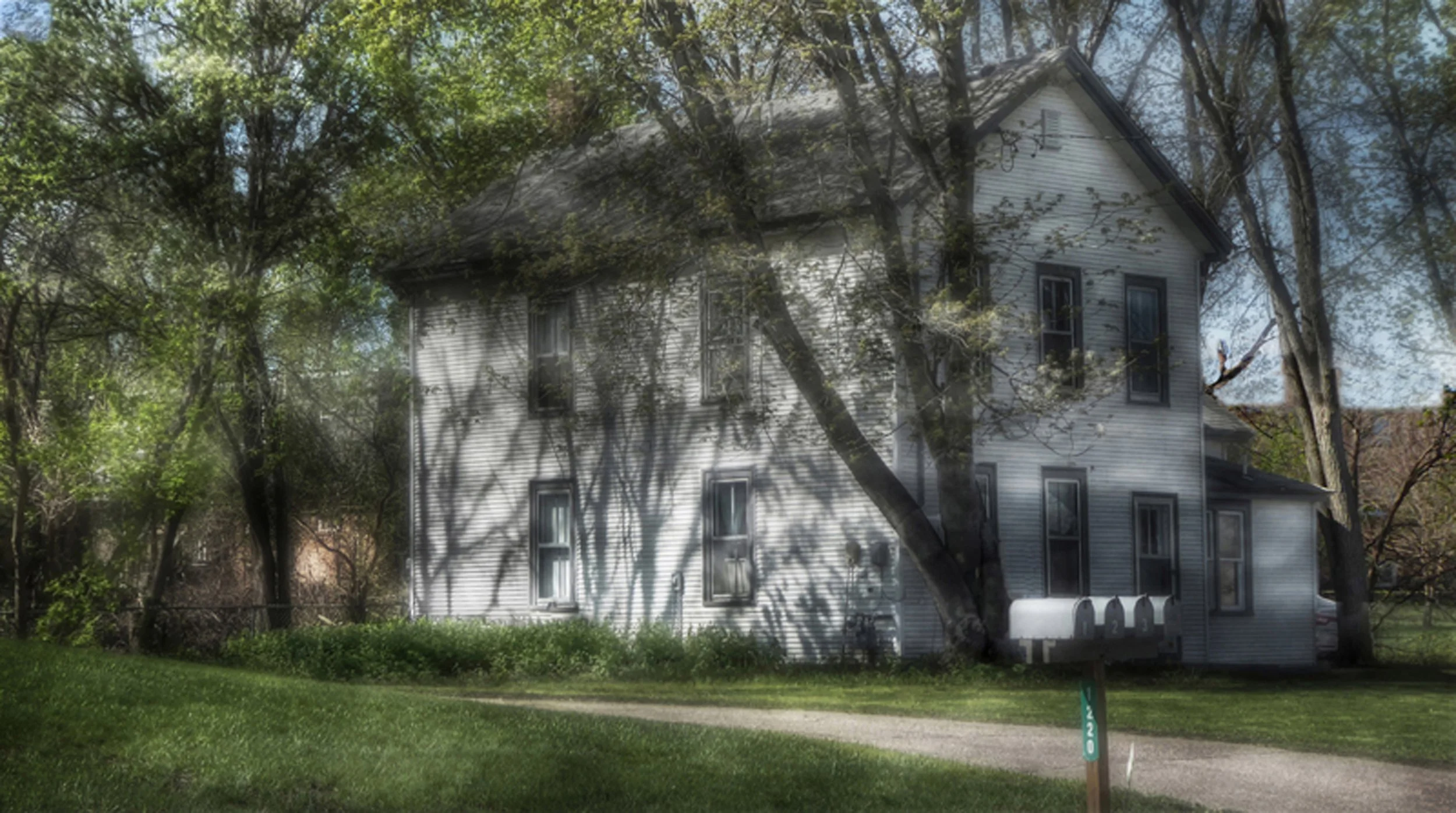 Old House in Sunlight and Wind