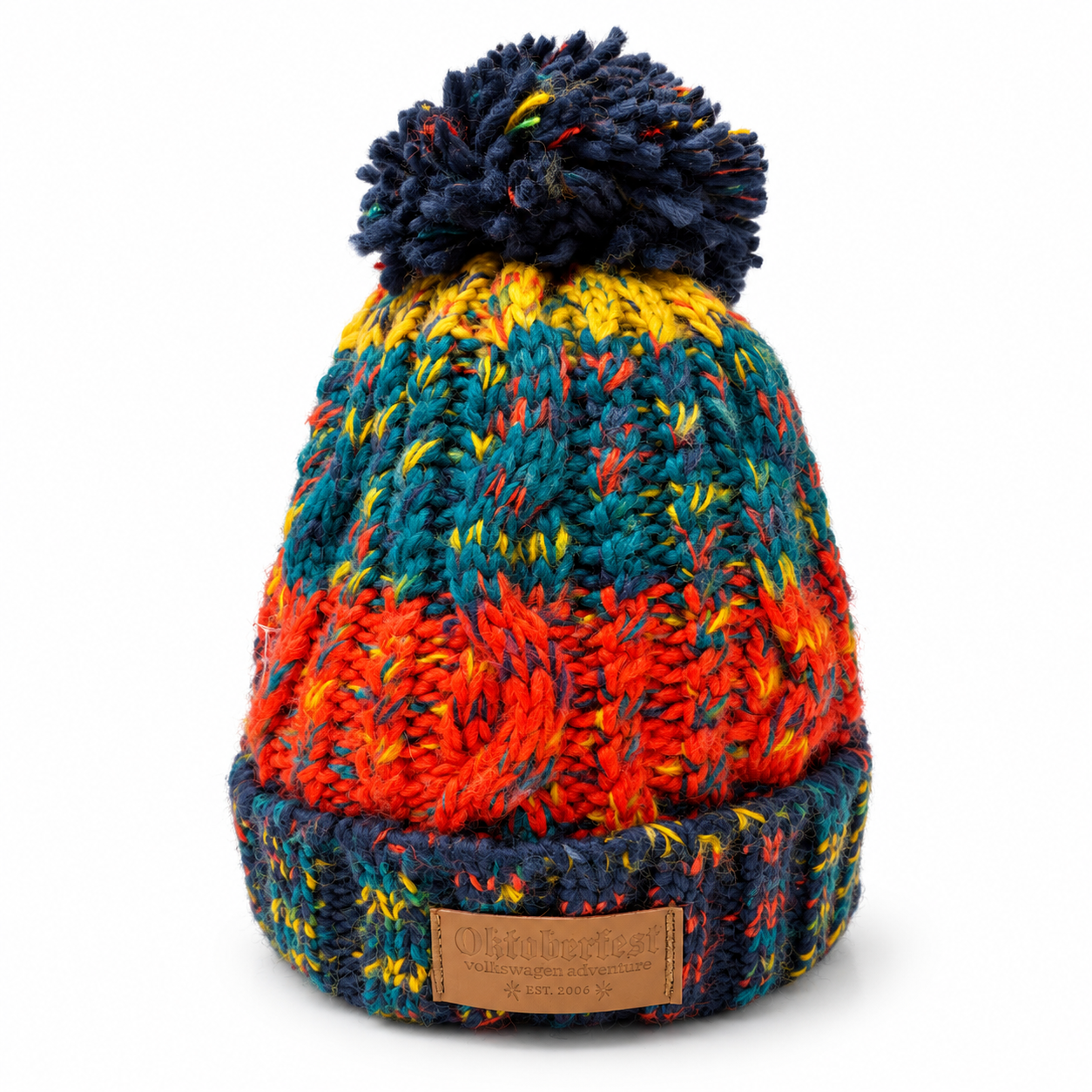 Multicolor cable-knit pompom hat.png