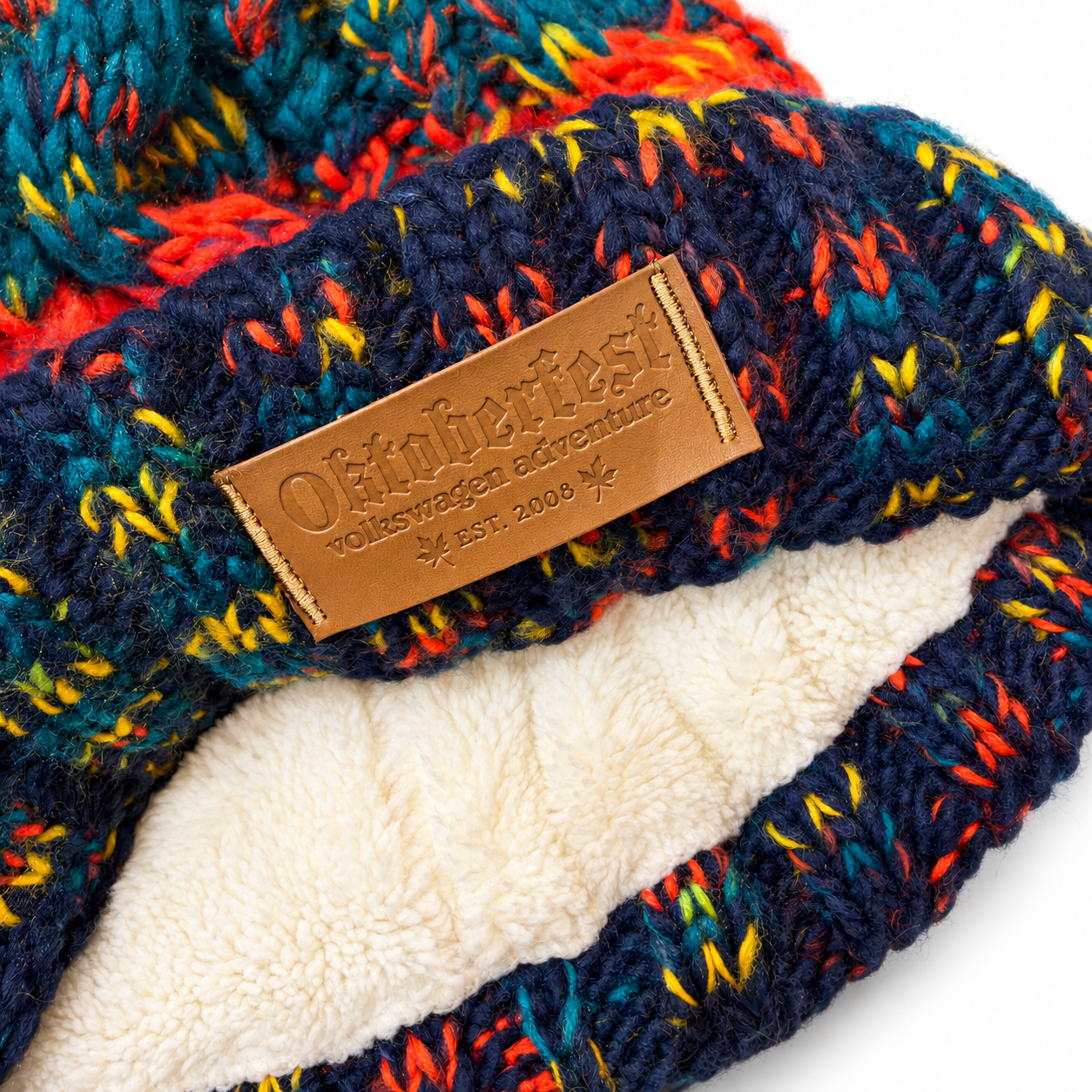 Chunky knit hat with embossed leather label.png