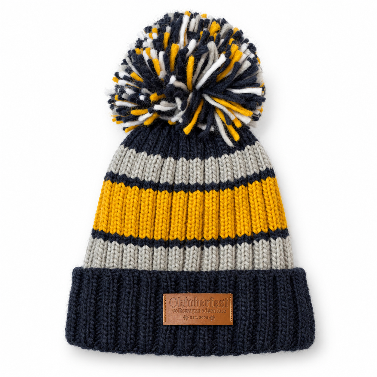 Chunky rib-knit hat with striped pompom.png