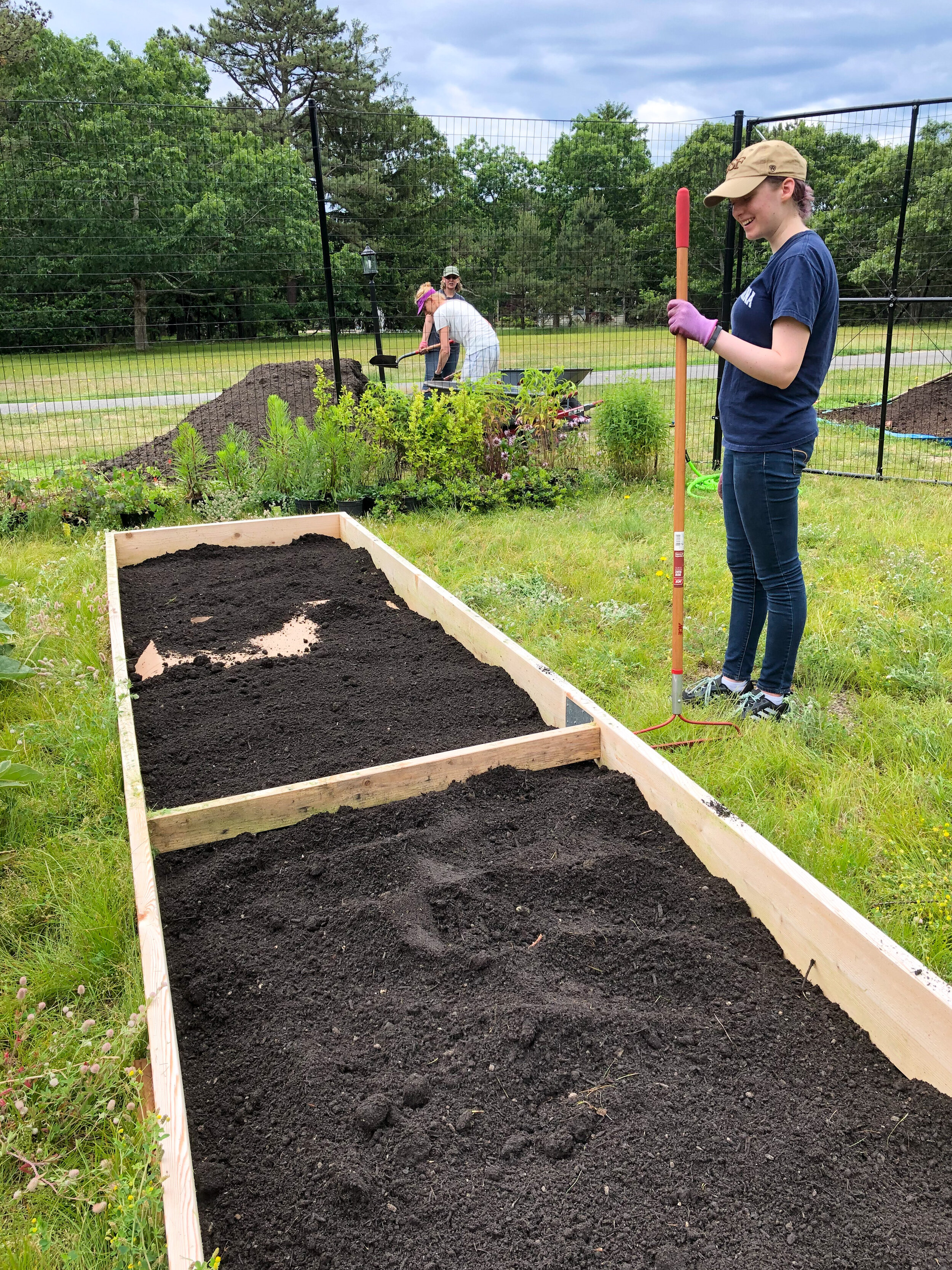 GGHG - Jun 23, 2019 - spreading compost in the beds.jpg