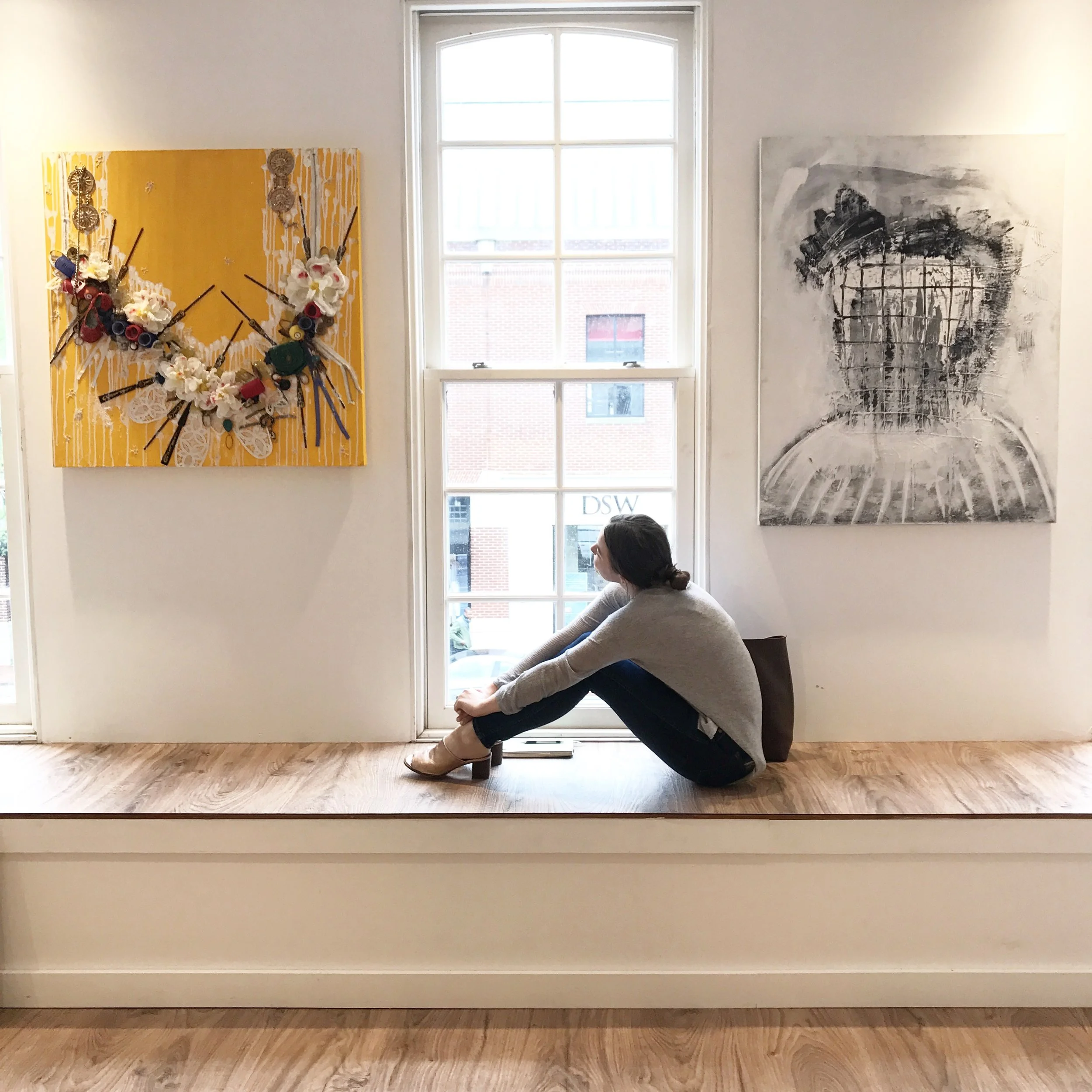 Art in photo: Left: Amber Robles-Gordon Right: Wayson R. Jones