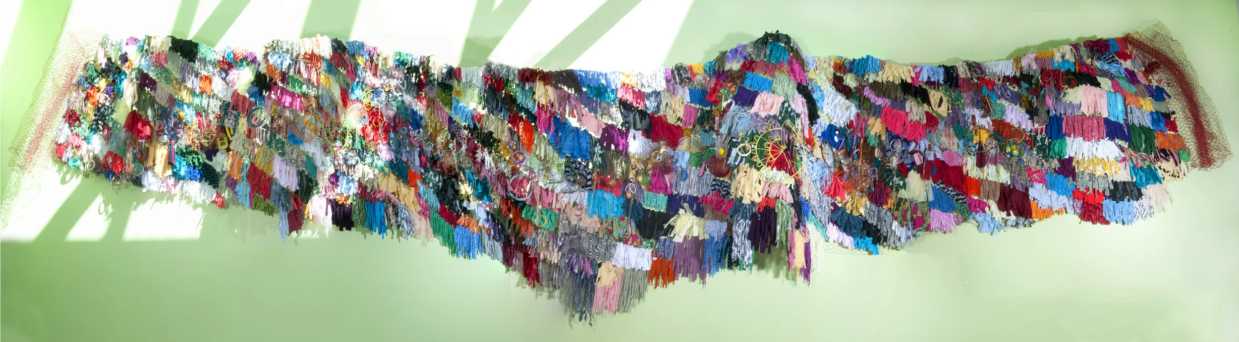 Beyond the Visual Rainbow, Commissioned Public Artwork, Mixed Media on Chicken Wire, 48 in. x 600 in, Deanwood Public Library, DC