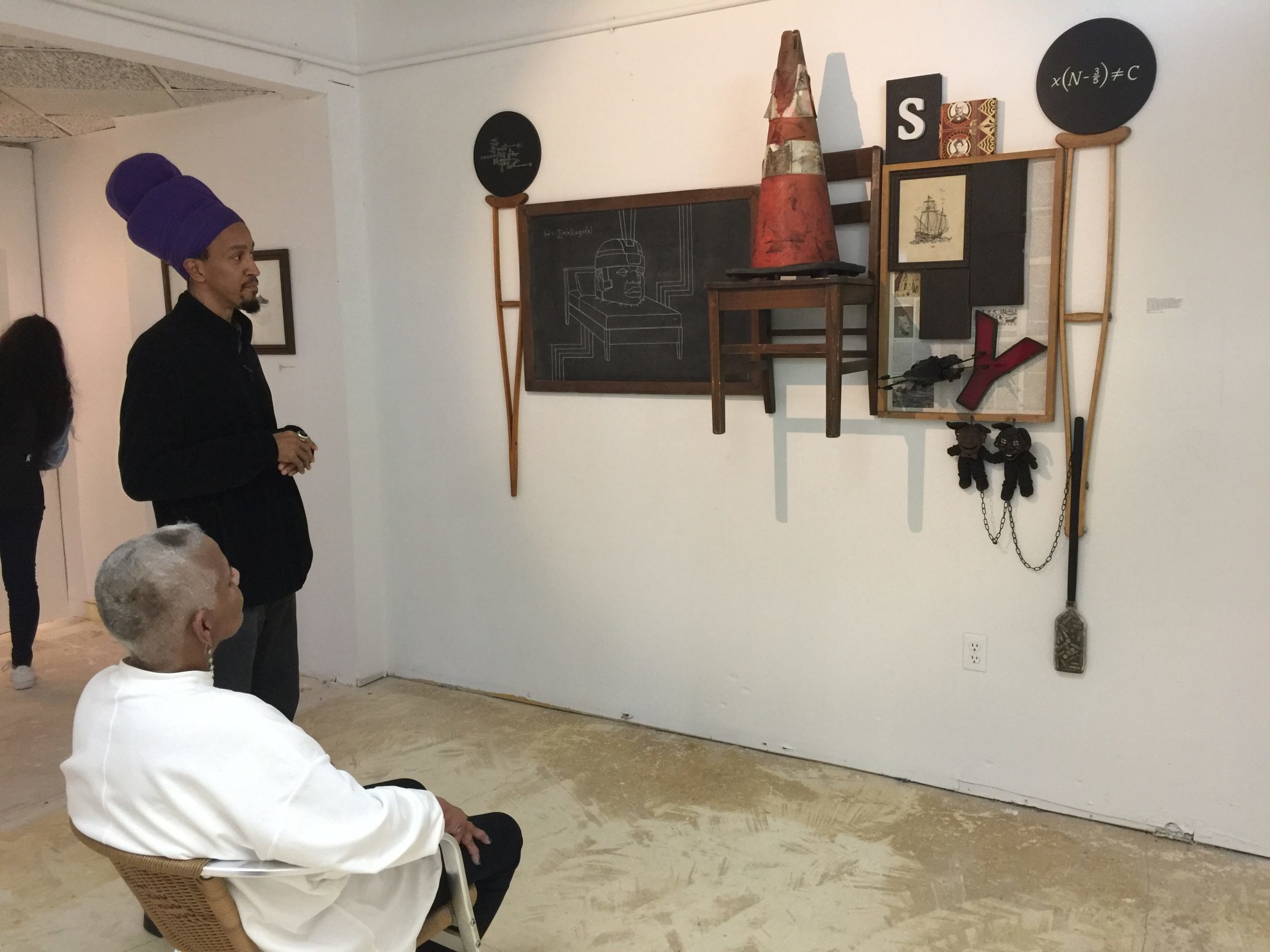 Peggy_Cooper_Cafritz_talking_with_artist_Andre_Leon_Gray.jpg