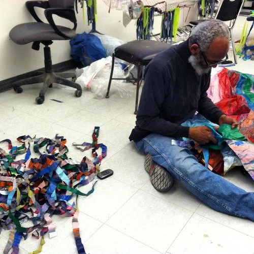 Artist and Howard University Professor James Phillips assisting during the workshop.